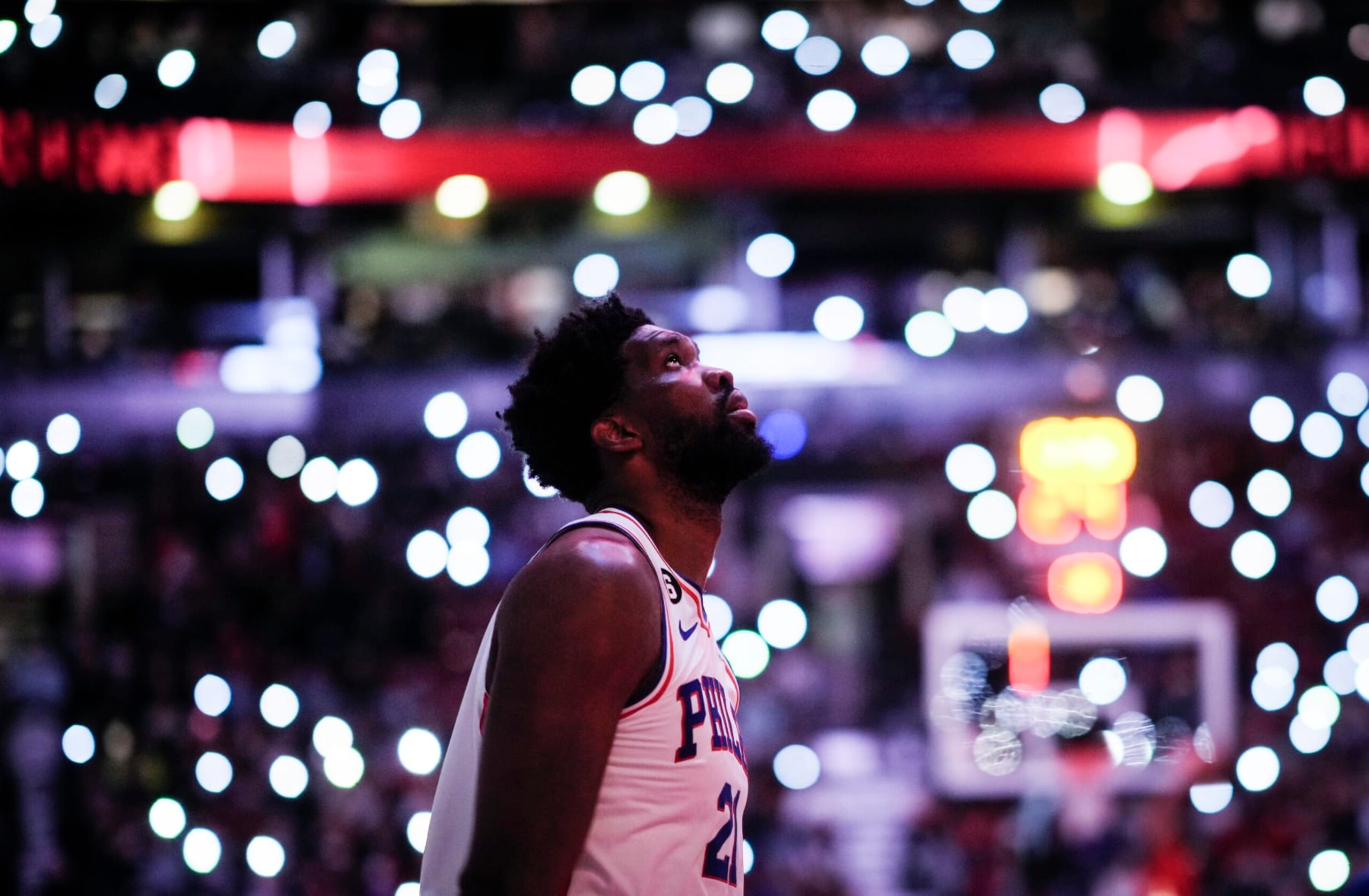 TORONTO, ON - OCTOBER 26: Joel Embiid #21 of the Philadelphia 76ers looks on during the pre-game show before playing the Toronto Raptors at the Scotiabank Arena on October 26, 2022 in Toronto, Ontario, Canada. NOTE TO USER: User expressly acknowledges and agrees that, by downloading and/or using this Photograph, user is consenting to the terms and conditions of the Getty Images License Agreement. (Photo by Mark Blinch/Getty Images)