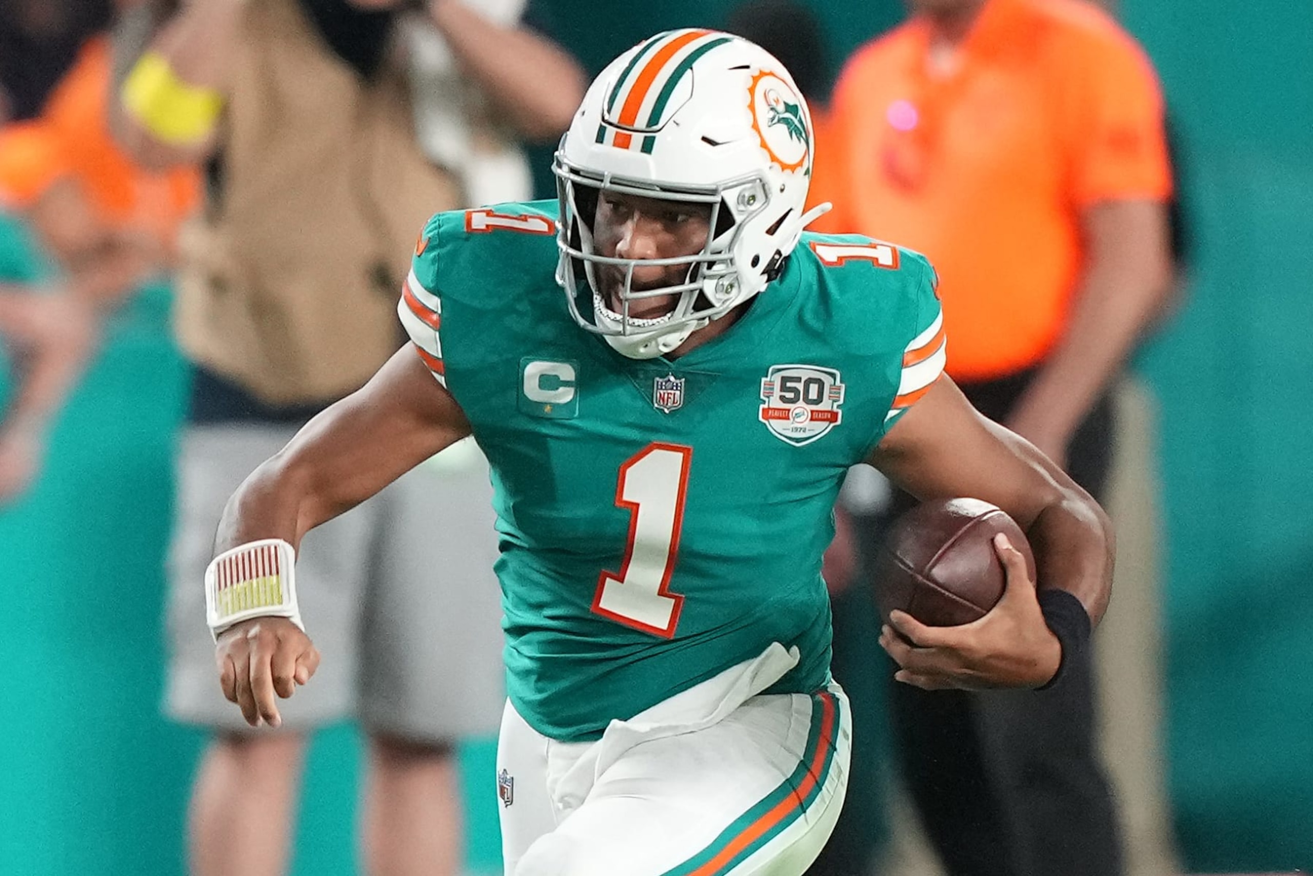 MIAMI GARDENS, FLORIDA - OCTOBER 23: Tua Tagovailoa #1 of the Miami Dolphins runs the ball during the third quarter against the Pittsburgh Steelers at Hard Rock Stadium on October 23, 2022 in Miami Gardens, Florida. (Photo by Eric Espada/Getty Images)
