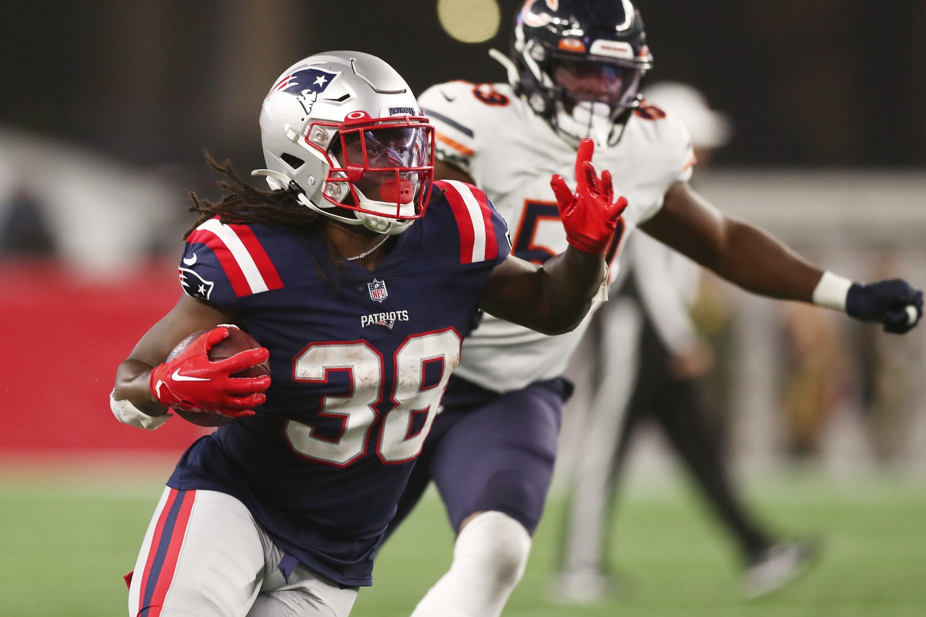 FOXBOROUGH, MASSACHUSETTS - OCTOBER 24: Rhamondre Stevenson #38 of the New England Patriots runs with the ball during the first half against the Chicago Bears at Gillette Stadium on October 24, 2022 in Foxborough, Massachusetts. (Photo by Adam Glanzman/Getty Images)