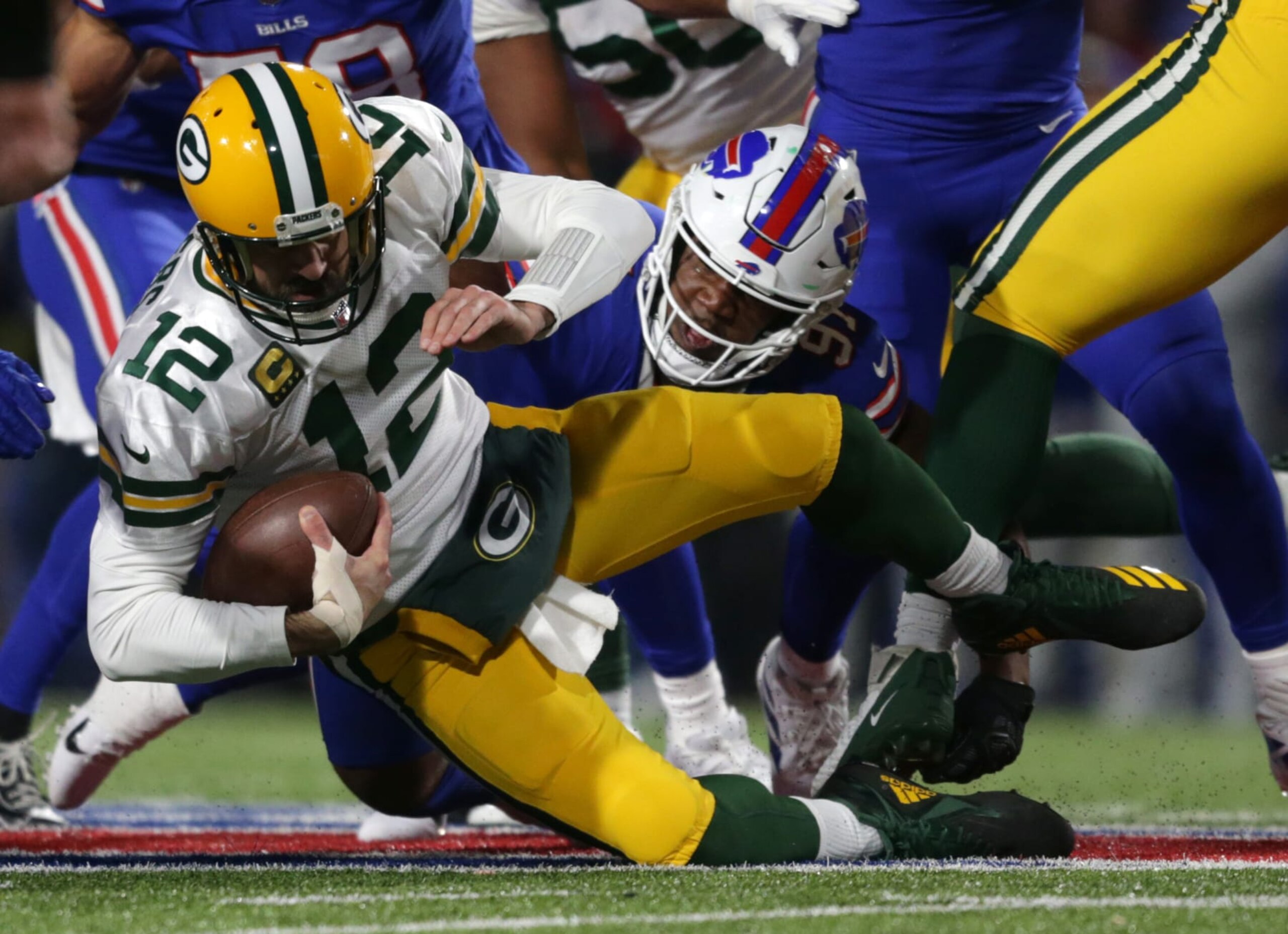 ORCHARD PARK, NEW YORK - OCTOBER 30: Ed Oliver #91 of the Buffalo Bills sacks Aaron Rodgers #12 of the Green Bay Packers during the first half at Highmark Stadium on October 30, 2022 in Orchard Park, New York. (Photo by Joshua Bessex/Getty Images)