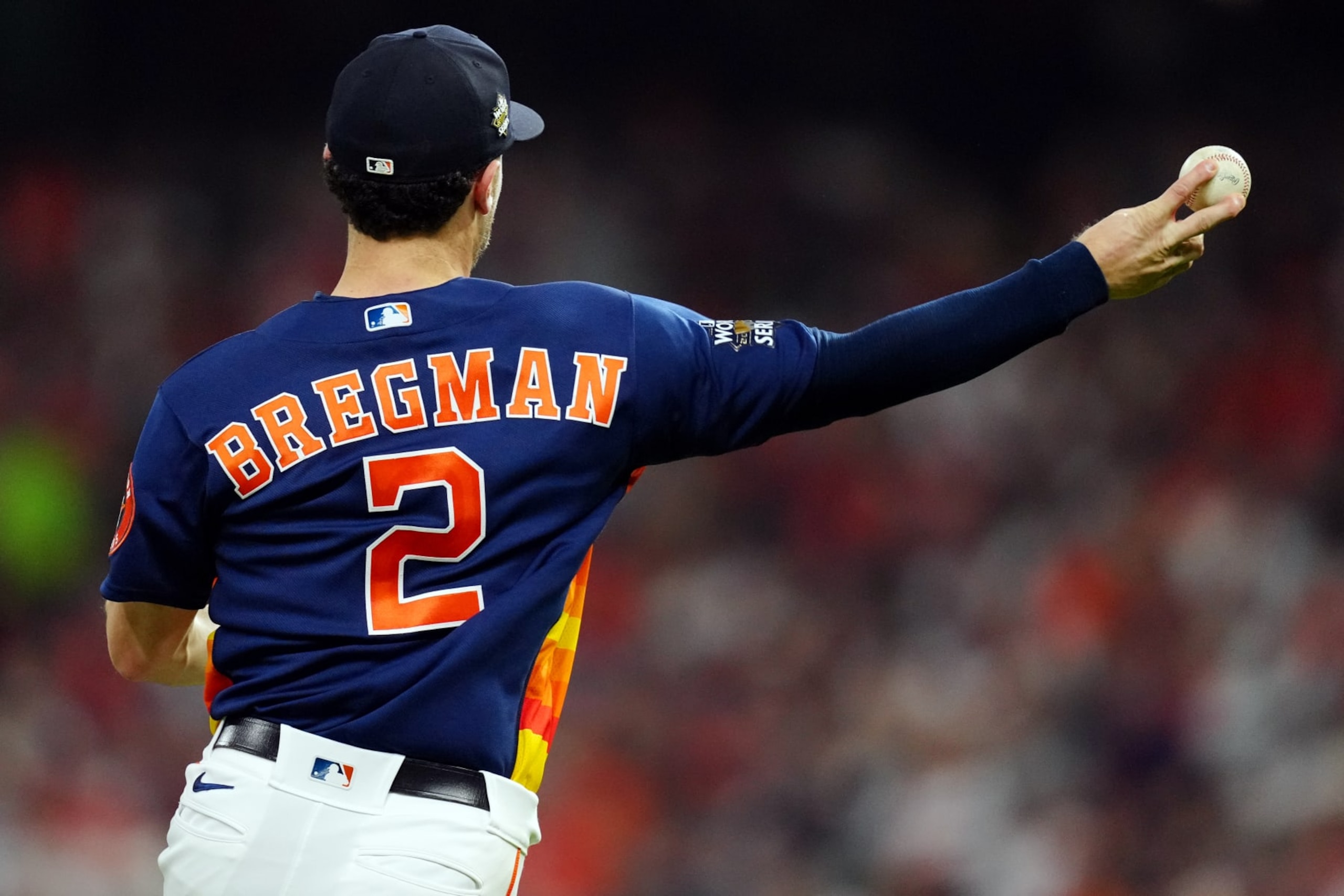 HOUSTON, TX - OCTOBER 29:  Alex Bregman #2 of the Houston Astros throws to first for the out during Game 2 of the 2022 World Series between the Philadelphia Phillies and the Houston Astros at Minute Maid Park on Saturday, October 29, 2022 in Houston, Texas. (Photo by Daniel Shirey/MLB Photos via Getty Images)