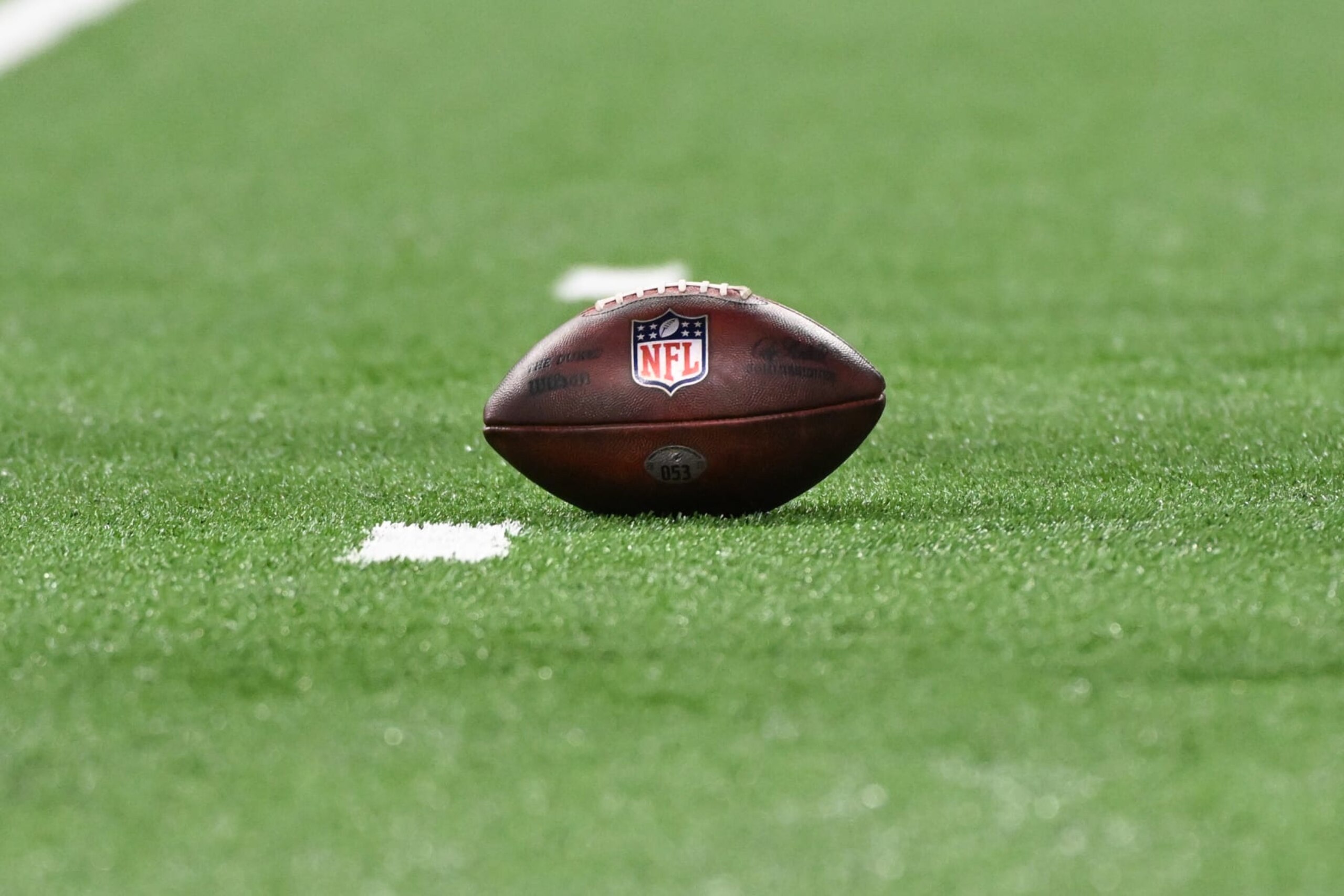 DETROIT, MI - OCTOBER 30: The NFL logo on a game ball during the Detroit Lions versus the Miami Dolphins game on Sunday October 30, 2022 at Ford Field in Detroit, MI. (Photo by Steven King/Icon Sportswire via Getty Images)