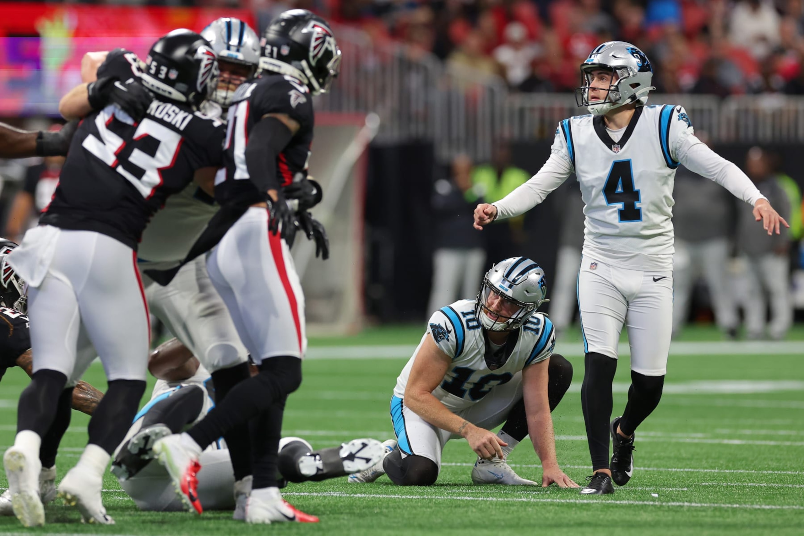 ATLANTA, GEORGIA - OCTOBER 30: Eddy Pineiro #4 of the Carolina Panthers kicks a field goal against the Atlanta Falcons during the first quarter at Mercedes-Benz Stadium on October 30, 2022 in Atlanta, Georgia. (Photo by Kevin C. Cox/Getty Images)