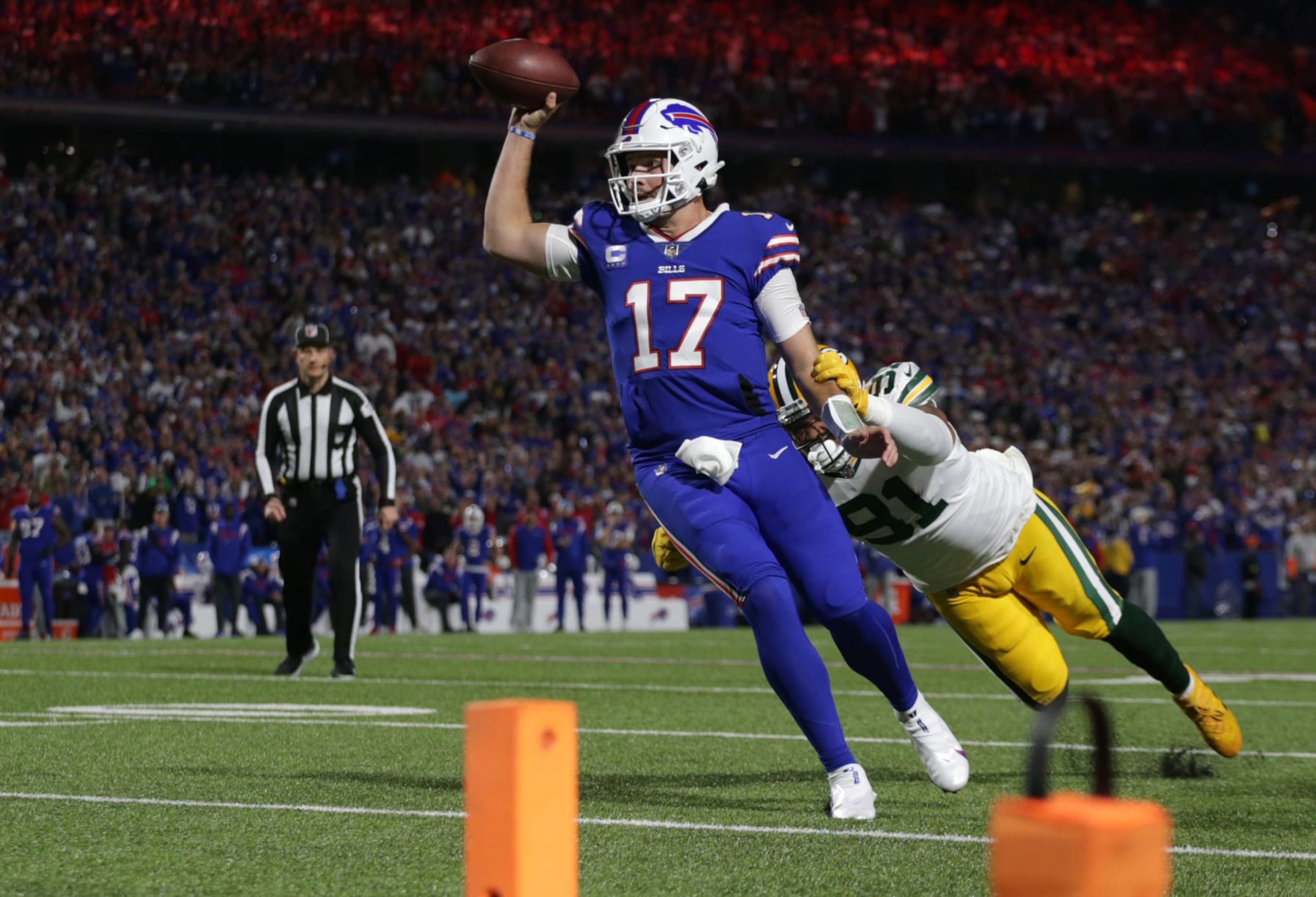 ORCHARD PARK, NEW YORK - OCTOBER 30: Josh Allen #17 of the Buffalo Bills throws a touchdown pass during the first quarter against the Green Bay Packers at Highmark Stadium on October 30, 2022 in Orchard Park, New York. (Photo by Joshua Bessex/Getty Images)