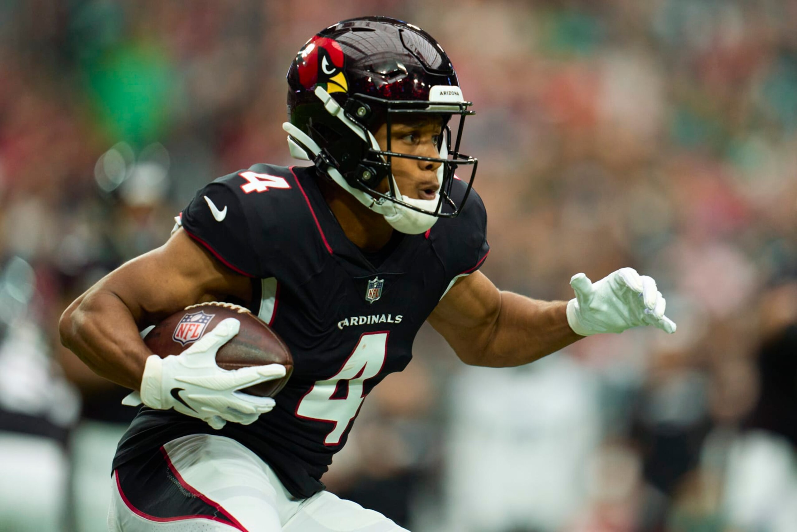 GLENDALE, AZ - OCTOBER 09: Rondale Moore #4 of the Arizona Cardinals runs with the ball against the Philadelphia Eagles at State Farm Stadium on October 9, 2022 in Glendale, Arizona. (Photo by Cooper Neill/Getty Images) GLENDALE, AZ - OCTOBER 09: Rondale Moore #4 of the Arizona Cardinals runs with the ball against the Philadelphia Eagles at State Farm Stadium on October 9, 2022 in Glendale, Arizona. (Photo by Cooper Neill/Getty Images)