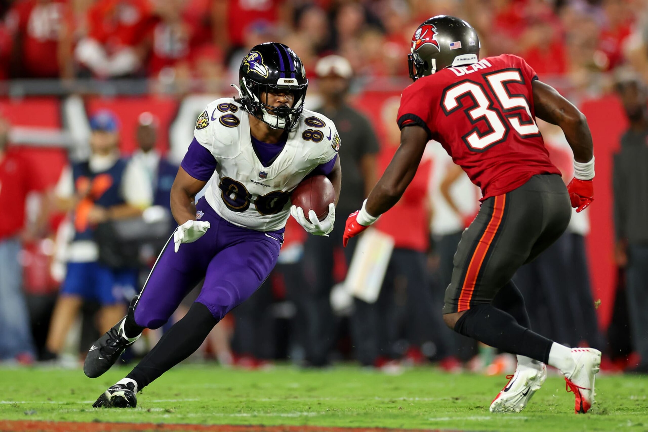 TAMPA, FLORIDA - OCTOBER 27: Isaiah Likely #80 of the Baltimore Ravens carries the ball against the Tampa Bay Buccaneers during the third quarter at Raymond James Stadium on October 27, 2022 in Tampa, Florida. (Photo by Mike Ehrmann/Getty Images)