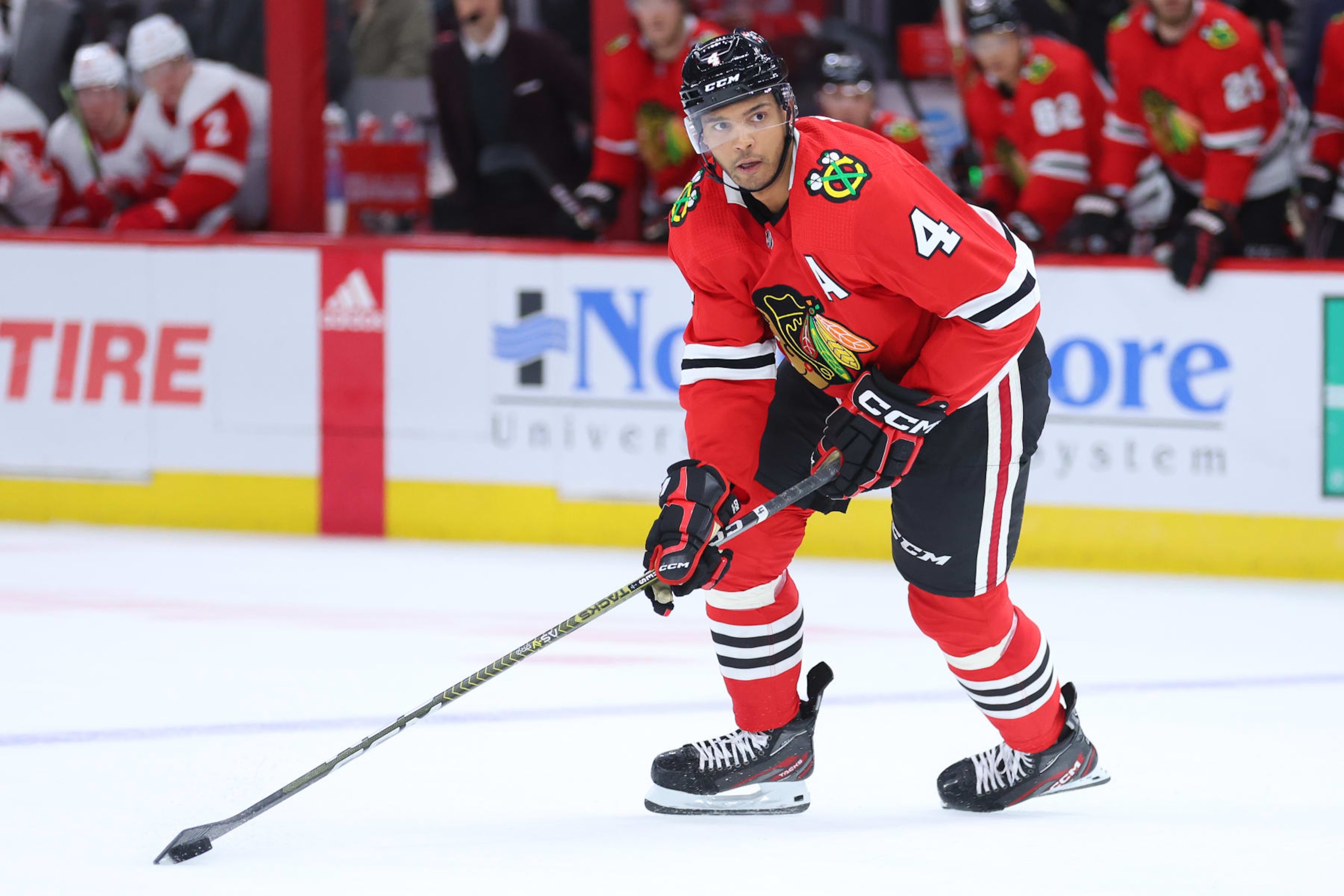 CHICAGO, ILLINOIS - OCTOBER 21: Seth Jones #4 of the Chicago Blackhawks skates with the puck against the Detroit Red Wings during overtime at United Center on October 21, 2022 in Chicago, Illinois. (Photo by Michael Reaves/Getty Images) CHICAGO, ILLINOIS - OCTOBER 21: Seth Jones #4 of the Chicago Blackhawks skates with the puck against the Detroit Red Wings during overtime at United Center on October 21, 2022 in Chicago, Illinois. (Photo by Michael Reaves/Getty Images)