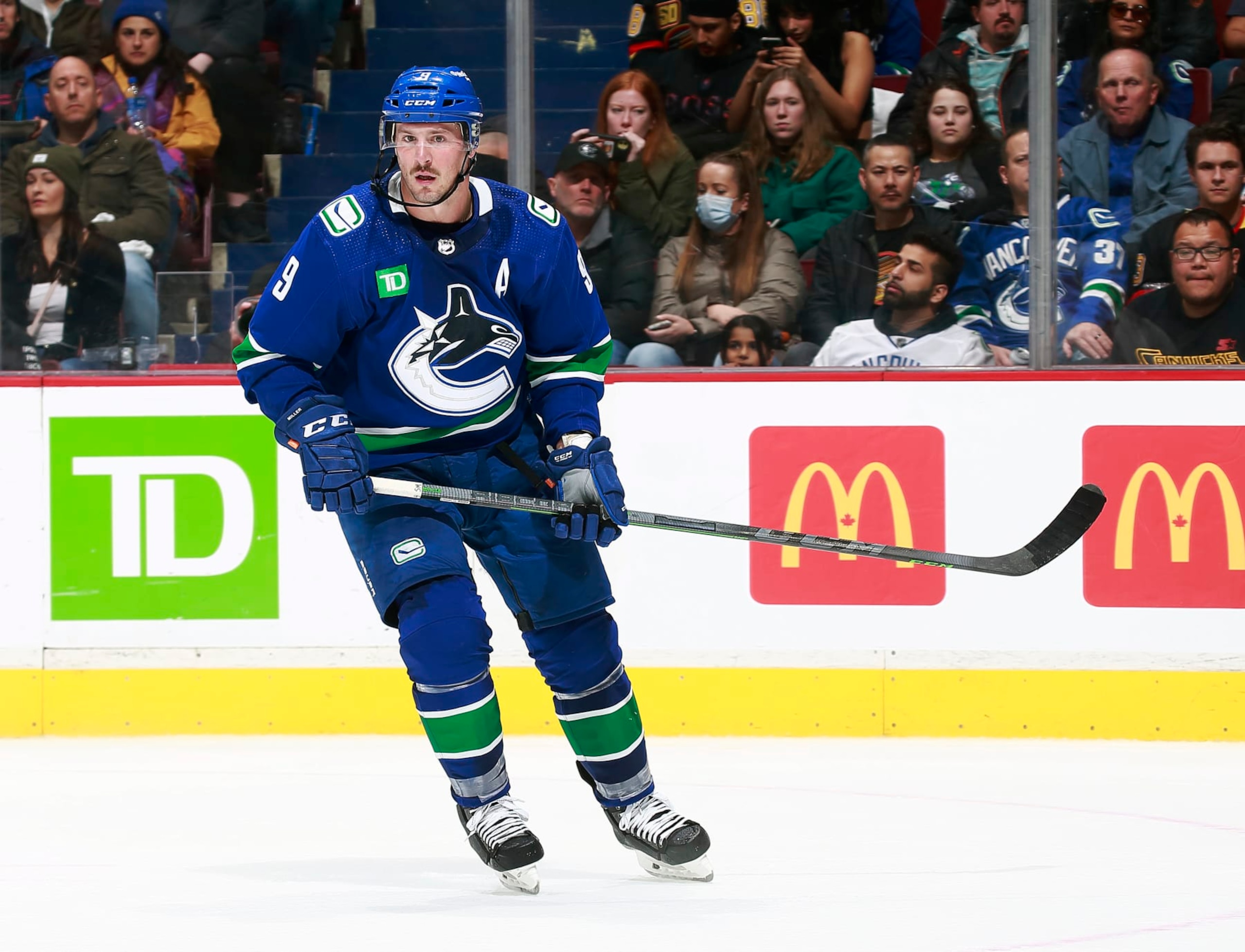 VANCOUVER, CANADA - OCTOBER 24: J.T. Miller #9 of the Vancouver Canucks skates up ice during their NHL game against the Carolina Hurricanes at Rogers Arena October 24, 2022 in Vancouver, British Columbia, Canada. (Photo by Jeff Vinnick/NHLI via Getty Images) VANCOUVER, CANADA - OCTOBER 24: J.T. Miller #9 of the Vancouver Canucks skates up ice during their NHL game against the Carolina Hurricanes at Rogers Arena October 24, 2022 in Vancouver, British Columbia, Canada. (Photo by Jeff Vinnick/NHLI via Getty Images)