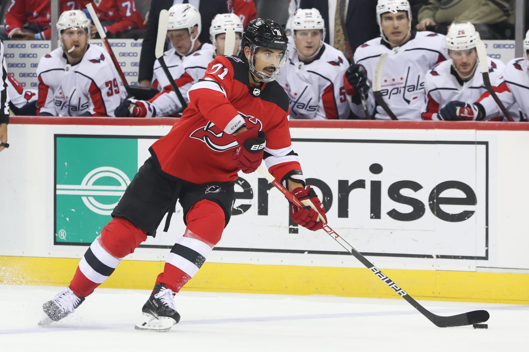 NEWARK, NJ - OCTOBER 24: New Jersey Devils defenseman Jonas Siegenthaler (71) skates with the puck during the National Hockey League game between the Washington Capitals and the New Jersey Devils on October 24, 2022 at Prudential Center in Newark, NJ. (Photo by Andrew Mordzynski/Icon Sportswire via Getty Images)