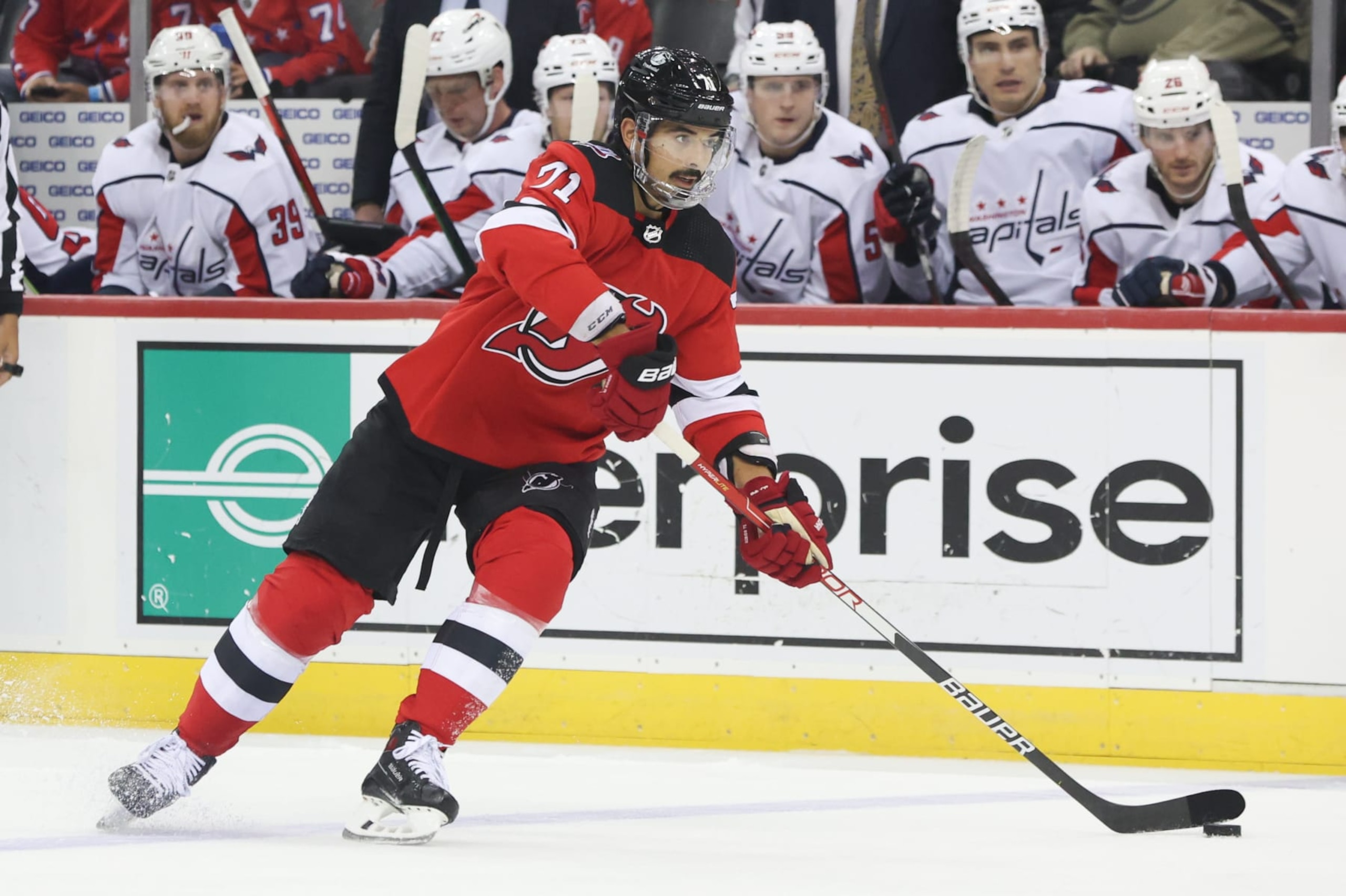 NEWARK, NJ - OCTOBER 24: New Jersey Devils defenseman Jonas Siegenthaler (71) skates with the puck during the National Hockey League game between the Washington Capitals and the New Jersey Devils on October 24, 2022 at Prudential Center in Newark, NJ. (Photo by Andrew Mordzynski/Icon Sportswire via Getty Images) NEWARK, NJ - OCTOBER 24: New Jersey Devils defenseman Jonas Siegenthaler (71) skates with the puck during the National Hockey League game between the Washington Capitals and the New Jersey Devils on October 24, 2022 at Prudential Center in Newark, NJ. (Photo by Andrew Mordzynski/Icon Sportswire via Getty Images)