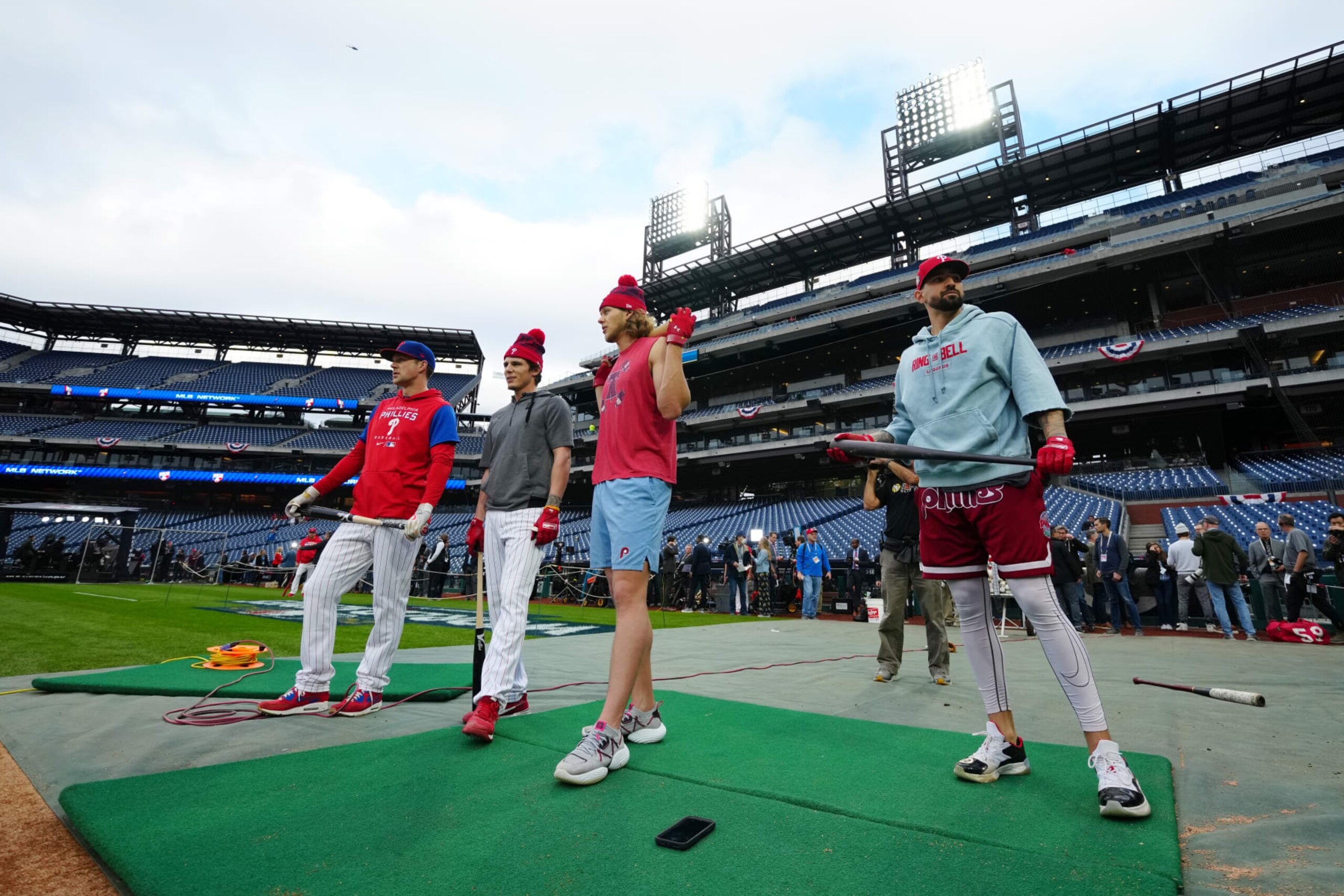 PHILADELPHIA, PA - OCTOBER 31: Rhys Hoskins #17, Nick Maton #29, Alec Bohm #28 and Nick Castellanos #8 of the Philadelphia Phillies look on during batting practice prior to Game 3 of the 2022 World Series between the Houston Astros and the Philadelphia Phillies at Citizens Bank Park on Monday, October 31, 2022 in Philadelphia, Pennsylvania. (Photo by Daniel Shirey/MLB Photos via Getty Images) PHILADELPHIA, PA - OCTOBER 31: Rhys Hoskins #17, Nick Maton #29, Alec Bohm #28 and Nick Castellanos #8 of the Philadelphia Phillies look on during batting practice prior to Game 3 of the 2022 World Series between the Houston Astros and the Philadelphia Phillies at Citizens Bank Park on Monday, October 31, 2022 in Philadelphia, Pennsylvania. (Photo by Daniel Shirey/MLB Photos via Getty Images)