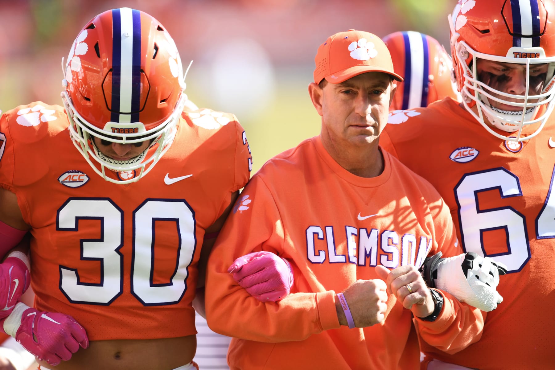 CLEMSON, SOUTH CAROLINA - OCTOBER 22: Head coach Dabo Swinney of the Clemson Tigers walks with his team during warm ups before their game against the Syracuse Orange at Memorial Stadium on October 22, 2022 in Clemson, South Carolina. (Photo by Eakin Howard/Getty Images)