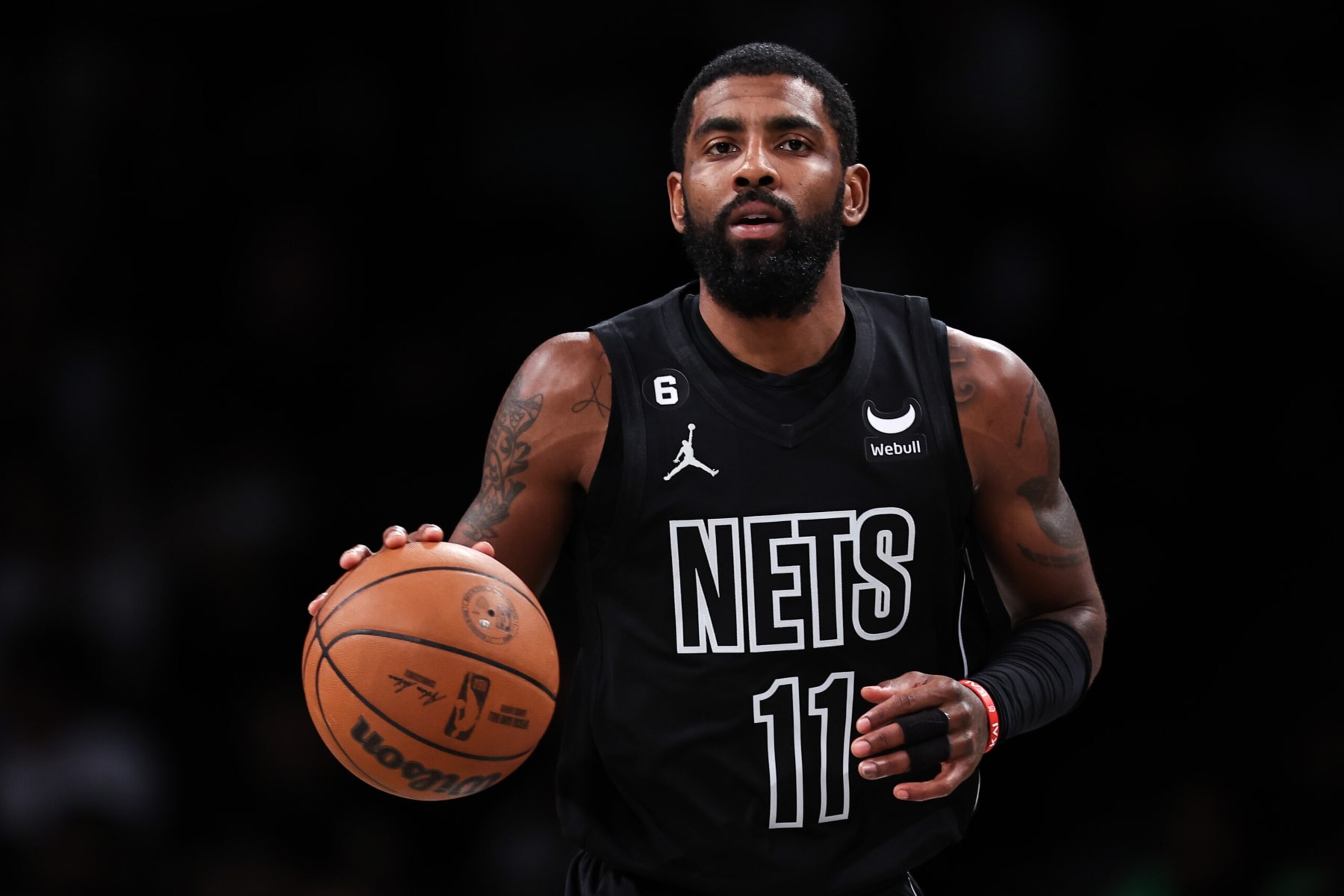NEW YORK, NEW YORK - OCTOBER 31: Kyrie Irving #11 of the Brooklyn Nets brings the ball up the court during the first quarter of the game against the Indiana Pacers at Barclays Center on October 31, 2022 in New York City. NOTE TO USER: User expressly acknowledges and agrees that, by downloading and or using this photograph, User is consenting to the terms and conditions of the Getty Images License Agreement. (Photo by Dustin Satloff/Getty Images) NEW YORK, NEW YORK - OCTOBER 31: Kyrie Irving #11 of the Brooklyn Nets brings the ball up the court during the first quarter of the game against the Indiana Pacers at Barclays Center on October 31, 2022 in New York City. NOTE TO USER: User expressly acknowledges and agrees that, by downloading and or using this photograph, User is consenting to the terms and conditions of the Getty Images License Agreement. (Photo by Dustin Satloff/Getty Images)