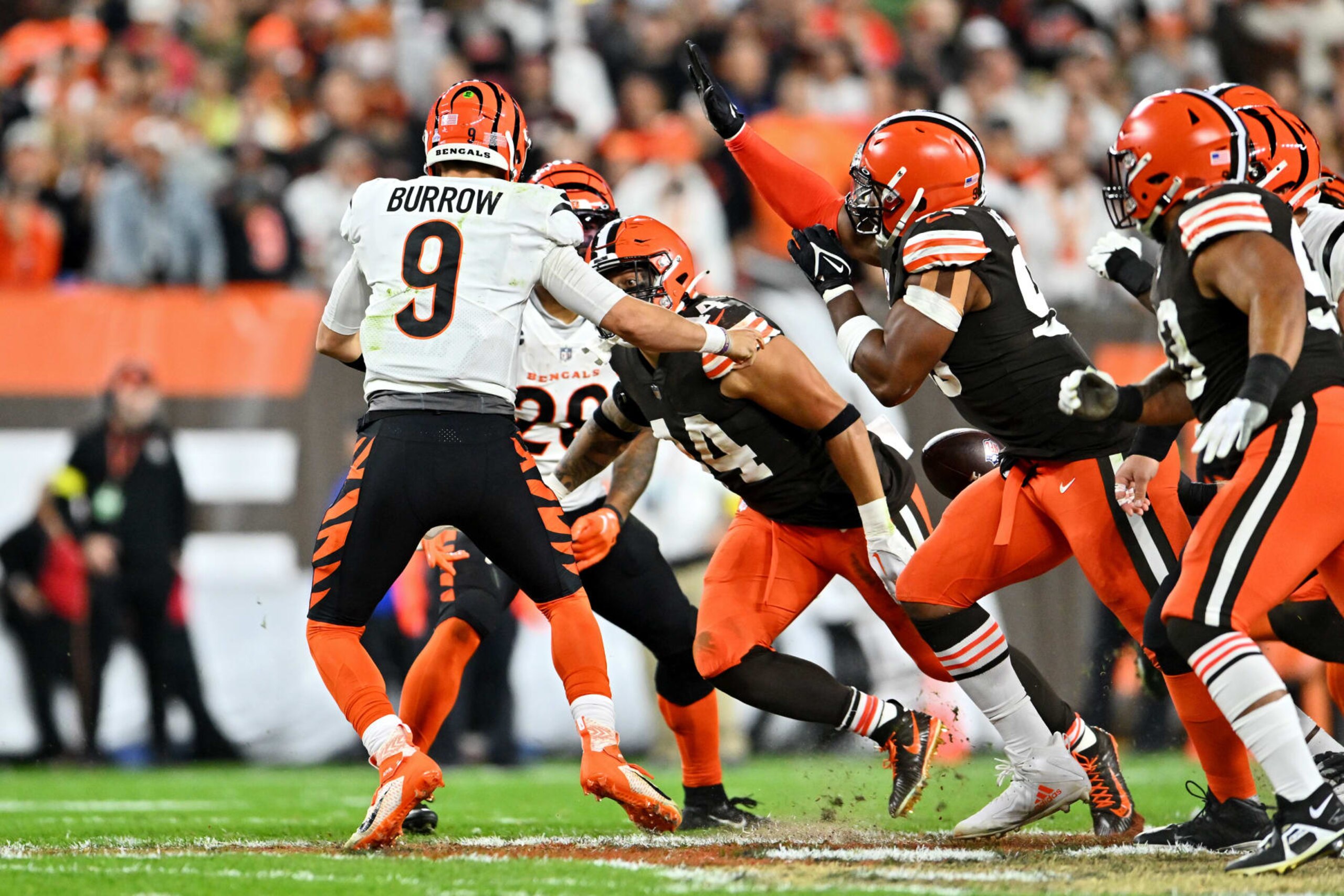 CLEVELAND, OHIO - OCTOBER 31: Joe Burrow #9 of the Cincinnati Bengals gets sacked during the first half of the game against the Cleveland Browns at FirstEnergy Stadium on October 31, 2022 in Cleveland, Ohio. (Photo by Jason Miller/Getty Images) CLEVELAND, OHIO - OCTOBER 31: Joe Burrow #9 of the Cincinnati Bengals gets sacked during the first half of the game against the Cleveland Browns at FirstEnergy Stadium on October 31, 2022 in Cleveland, Ohio. (Photo by Jason Miller/Getty Images)