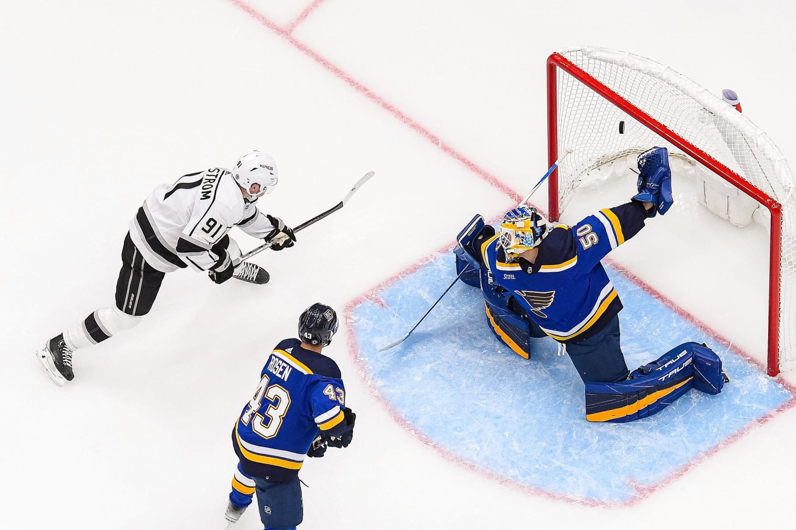 ST. LOUIS, MO - OCTOBER 31: Carl Grundstrom #91 of the Los Angeles Kings scores a goal against Jordan Binnington #50 of the St. Louis Blues at the Enterprise Center on October 31, 2022 in St. Louis, Missouri. (Photo by Scott Rovak/NHLI via Getty Images) ST. LOUIS, MO - OCTOBER 31: Carl Grundstrom #91 of the Los Angeles Kings scores a goal against Jordan Binnington #50 of the St. Louis Blues at the Enterprise Center on October 31, 2022 in St. Louis, Missouri. (Photo by Scott Rovak/NHLI via Getty Images)