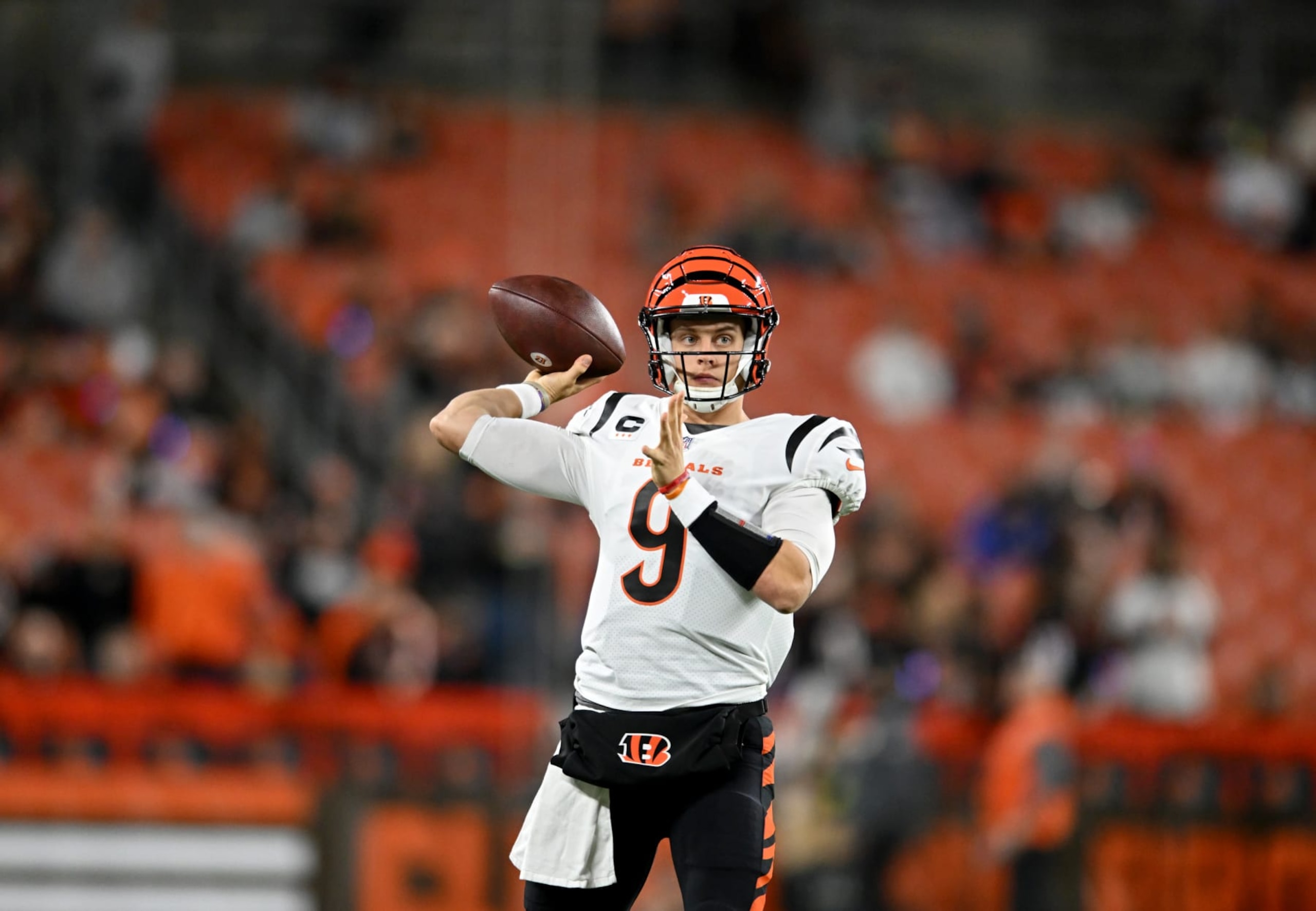 CLEVELAND, OHIO - OCTOBER 31: Joe Burrow #9 of the Cincinnati Bengals throws the ball during warmups before the game against the Cleveland Browns at FirstEnergy Stadium on October 31, 2022 in Cleveland, Ohio. (Photo by Nick Cammett/Getty Images)