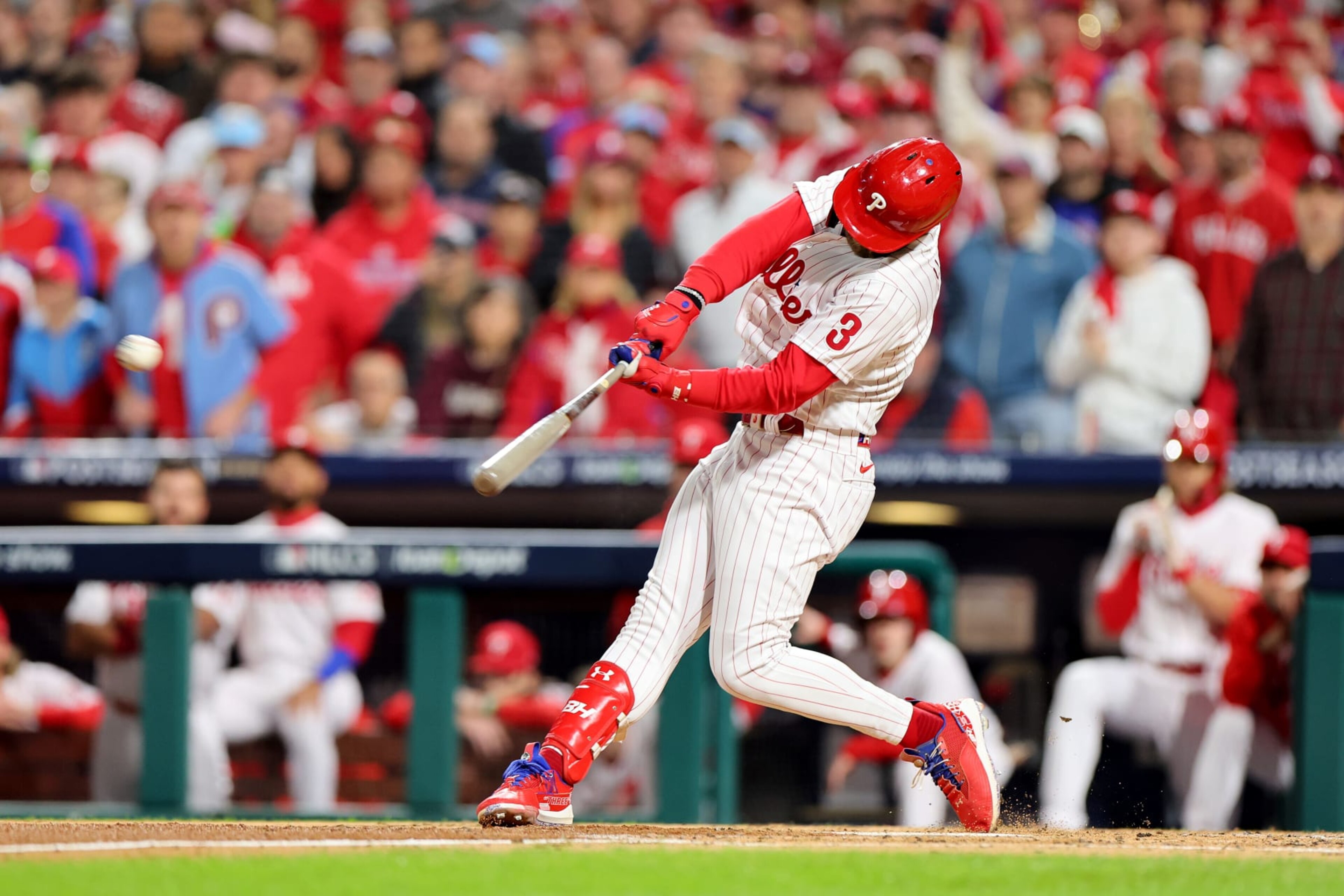PHILADELPHIA, PENNSYLVANIA - OCTOBER 22: Bryce Harper #3 of the Philadelphia Phillies hits an RBI double during the first inning against the San Diego Padres in game four of the National League Championship Series at Citizens Bank Park on October 22, 2022 in Philadelphia, Pennsylvania. (Photo by Michael Reaves/Getty Images)