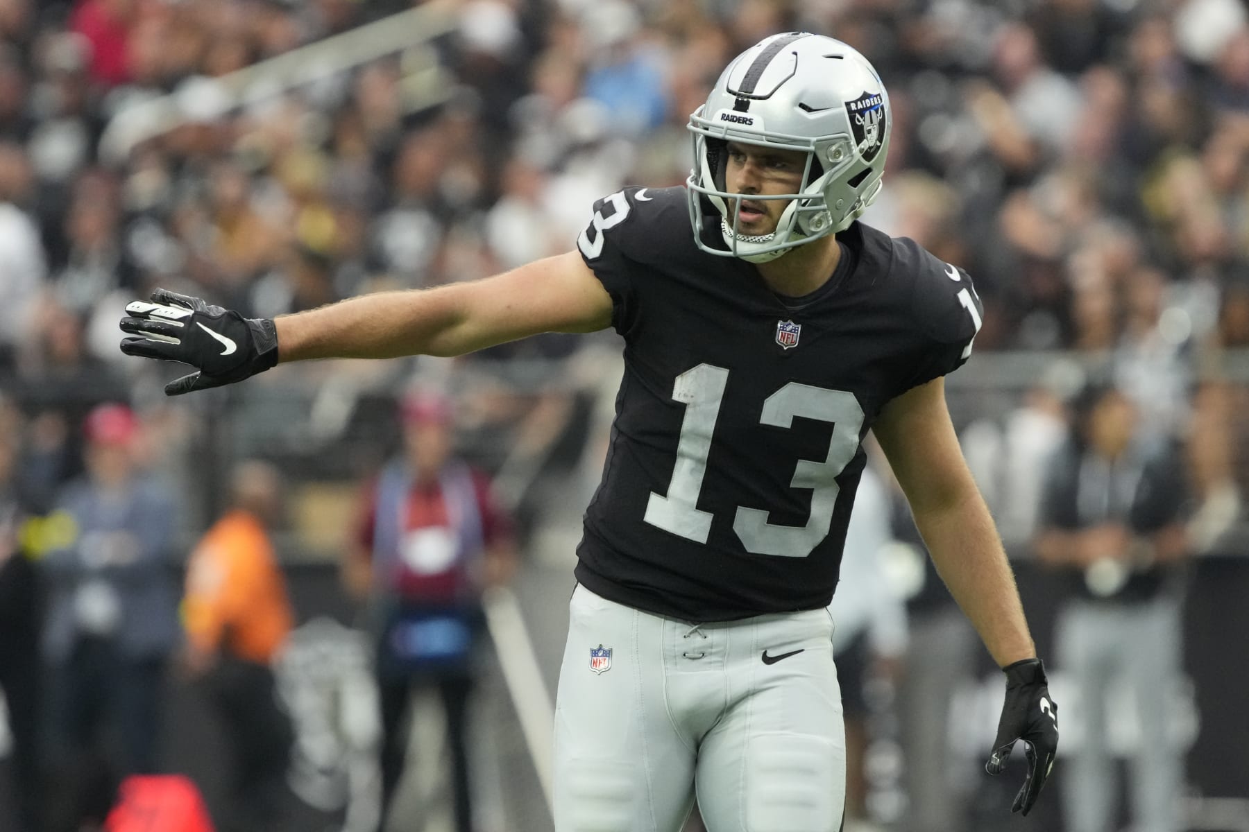 Las Vegas Raiders wide receiver Hunter Renfrow (13) lines up during the first half of an NFL football game against the Arizona Cardinals, Sunday, Sept. 18, 2022, in Las Vegas. (AP Photo/Rick Scuteri)
