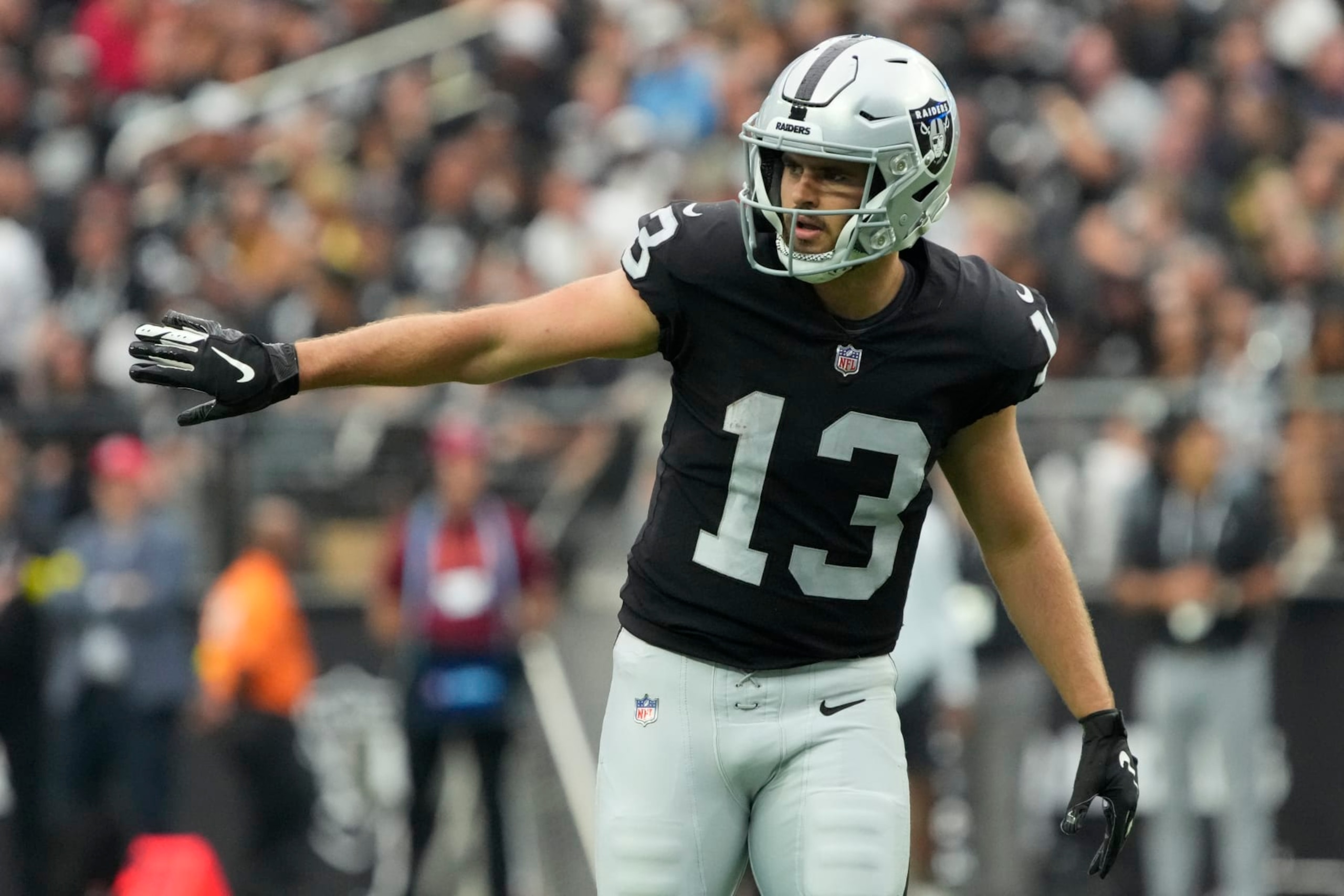 Las Vegas Raiders wide receiver Hunter Renfrow (13) lines up during the first half of an NFL football game against the Arizona Cardinals, Sunday, Sept. 18, 2022, in Las Vegas. (AP Photo/Rick Scuteri) Las Vegas Raiders wide receiver Hunter Renfrow (13) lines up during the first half of an NFL football game against the Arizona Cardinals, Sunday, Sept. 18, 2022, in Las Vegas. (AP Photo/Rick Scuteri)