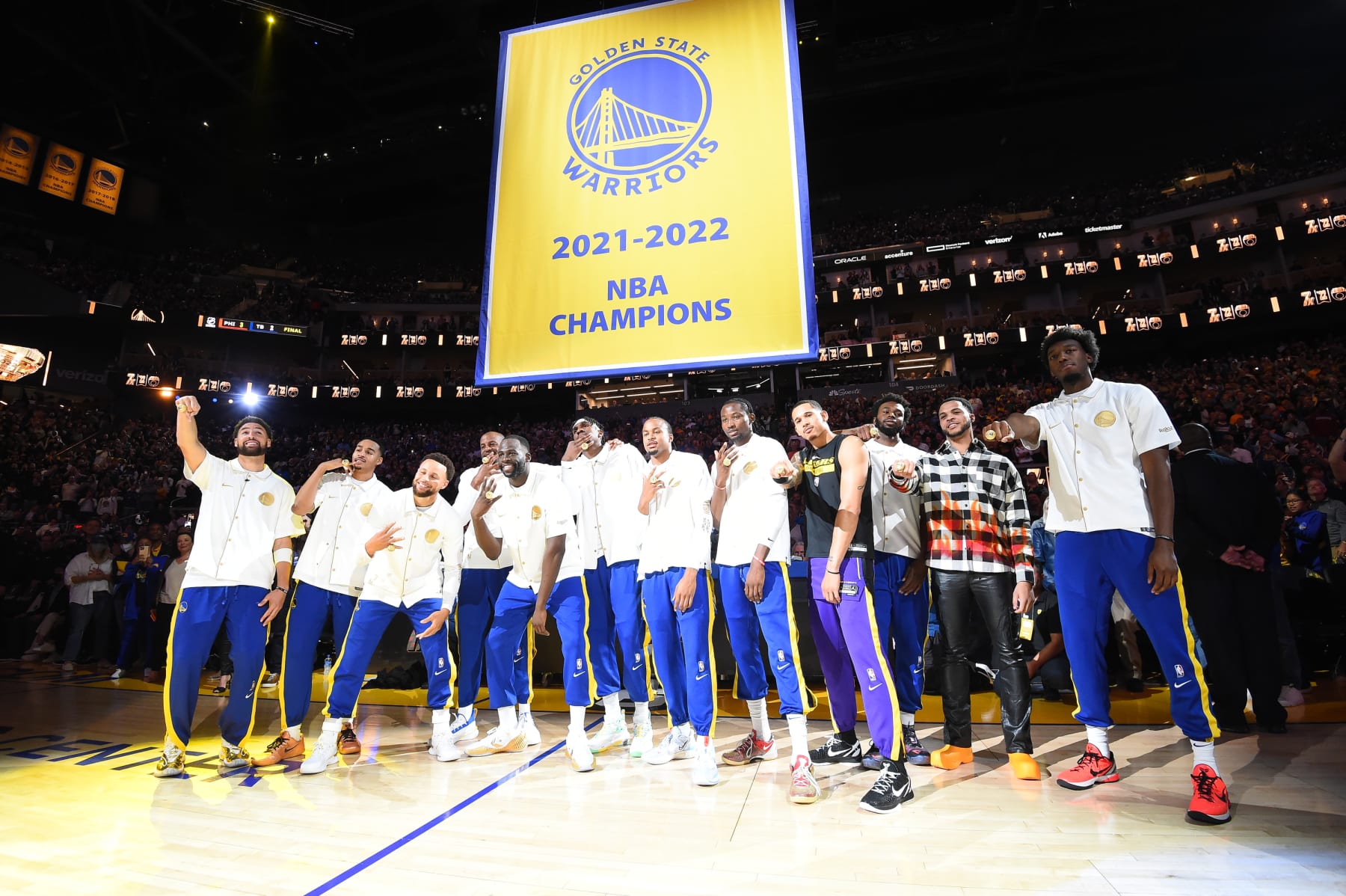 SAN FRANCISCO, CA - OCTOBER 18: The Golden State Warriors poses for a photo with their rings on ring night prior to the game against the Los Angeles Lakers on October 18, 2022 at Chase Center in San Francisco, California. NOTE TO USER: User expressly acknowledges and agrees that, by downloading and or using this photograph, user is consenting to the terms and conditions of Getty Images License Agreement. Mandatory Copyright Notice: Copyright 2022 NBAE (Photo by Andrew D. Bernstein/NBAE via Getty Images)