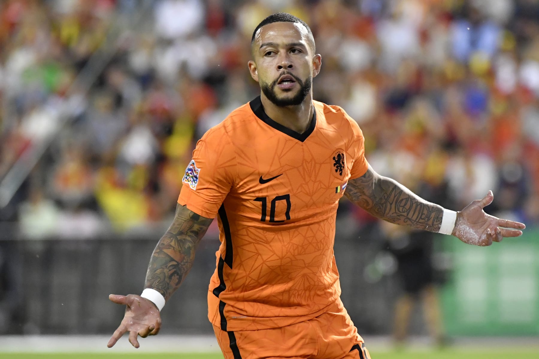 Netherlands' Memphis Depay celebrates after scoring his side's second goal during the UEFA Nations League soccer match between Belgium and the Netherlands, at the King Baudouin Stadium in Brussels, Friday, June 3, 2022. (AP Photo/Geert Vanden Wijngaert)