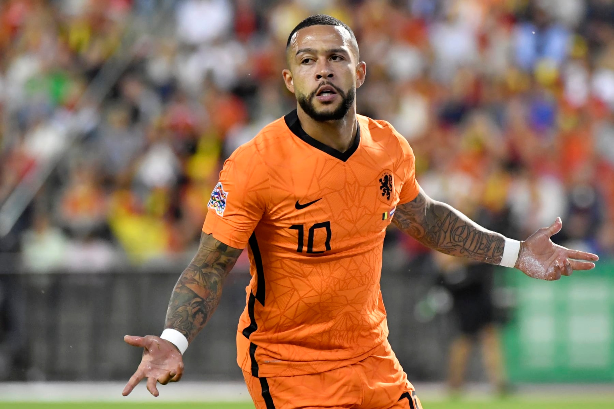 Netherlands' Memphis Depay celebrates after scoring his side's second goal during the UEFA Nations League soccer match between Belgium and the Netherlands, at the King Baudouin Stadium in Brussels, Friday, June 3, 2022. (AP Photo/Geert Vanden Wijngaert)