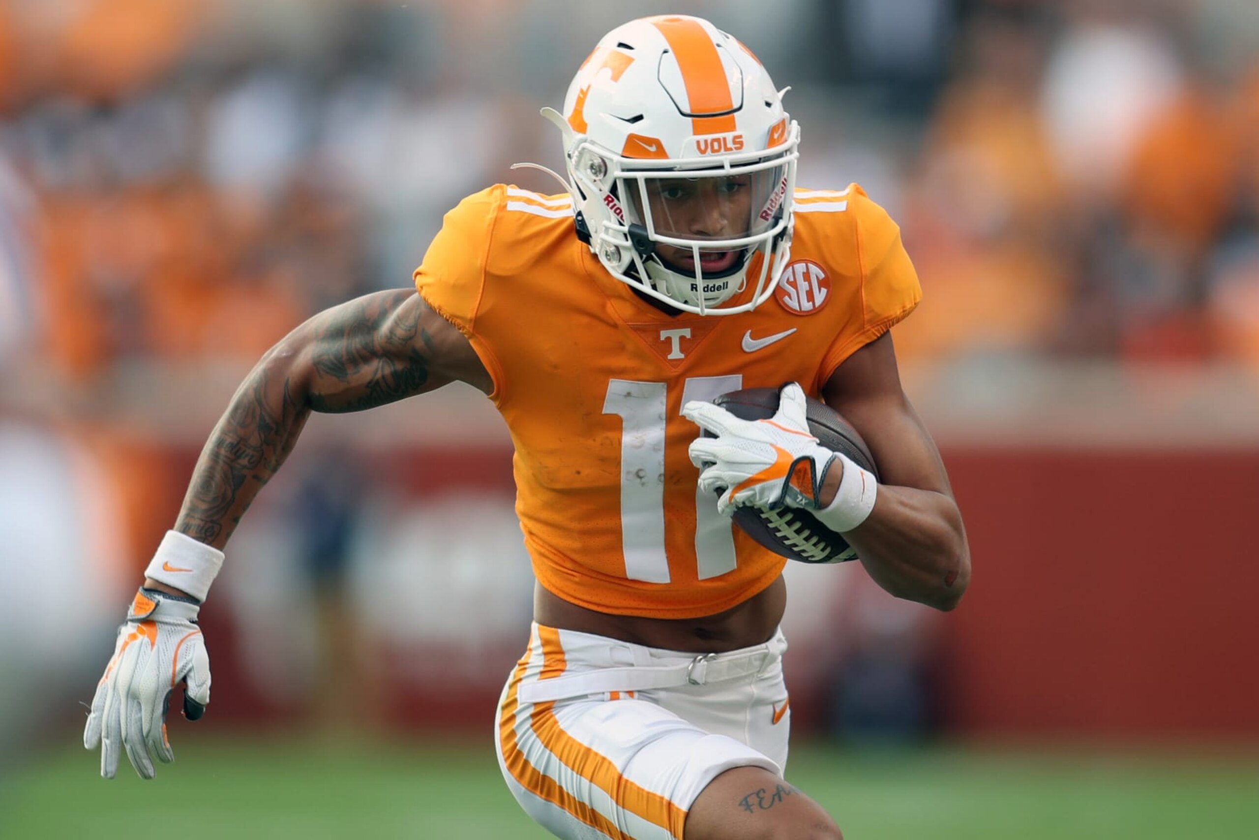 KNOXVILLE, TENNESSEE - SEPTEMBER 24: Jalin Hyatt #11 of the Tennessee Volunteers runs with the ball against the Florida Gators at Neyland Stadium on September 24, 2022 in Knoxville, Tennessee. Tennessee won the game 38-33. (Photo by Donald Page/Getty Images) KNOXVILLE, TENNESSEE - SEPTEMBER 24: Jalin Hyatt #11 of the Tennessee Volunteers runs with the ball against the Florida Gators at Neyland Stadium on September 24, 2022 in Knoxville, Tennessee. Tennessee won the game 38-33. (Photo by Donald Page/Getty Images)