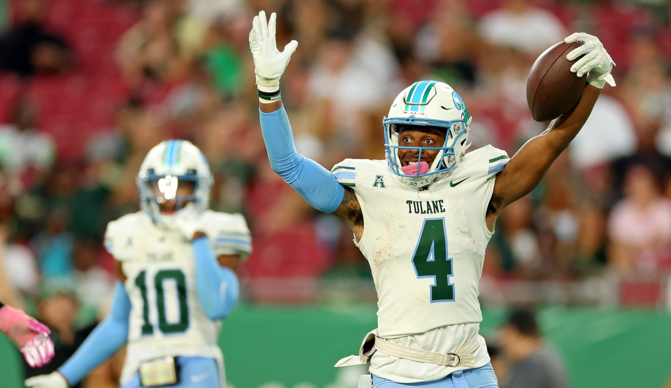 TAMPA, FLORIDA - OCTOBER 15: Jha'Quan Jackson #4 of the Tulane Green Wave reacts to a play during a game against the South Florida Bulls at Raymond James Stadium on October 15, 2022 in Tampa, Florida. (Photo by Mike Ehrmann/Getty Images) TAMPA, FLORIDA - OCTOBER 15: Jha'Quan Jackson #4 of the Tulane Green Wave reacts to a play during a game against the South Florida Bulls at Raymond James Stadium on October 15, 2022 in Tampa, Florida. (Photo by Mike Ehrmann/Getty Images)