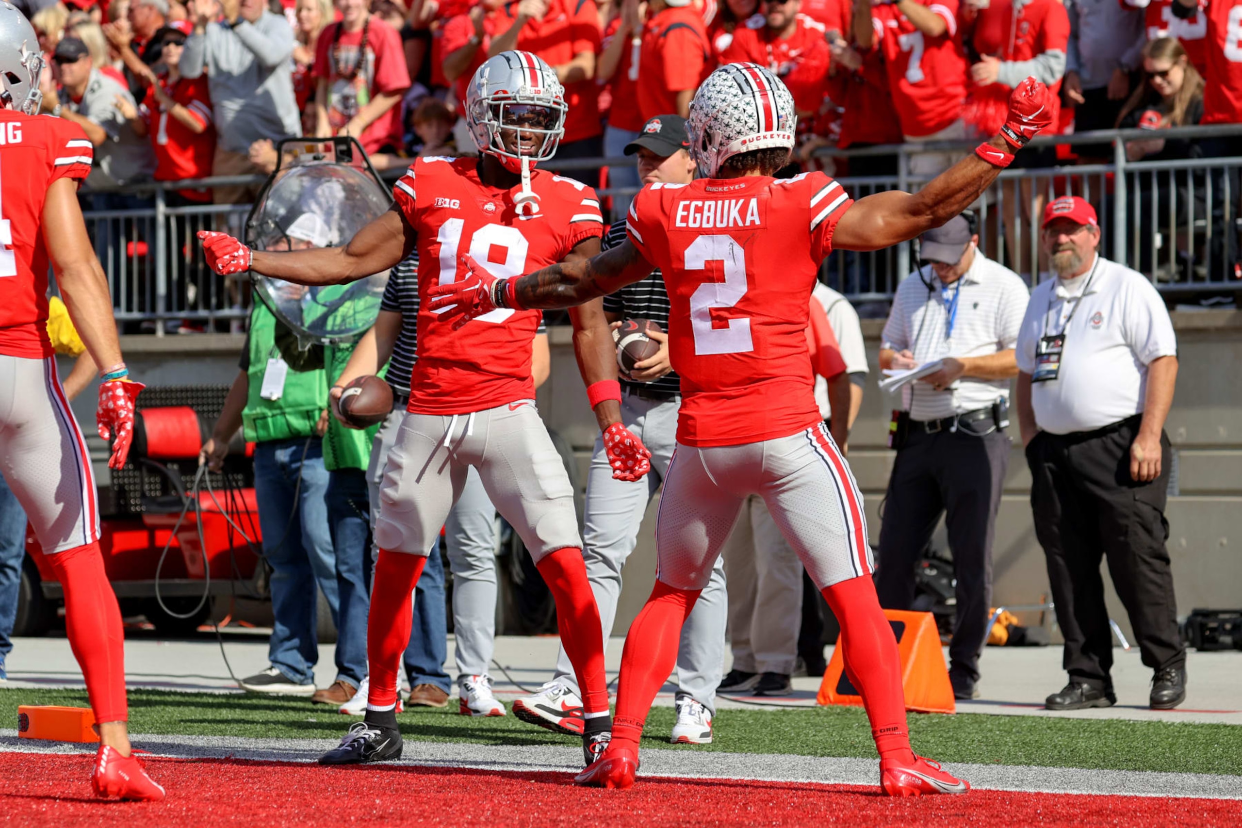 COLUMBUS, OH - OCTOBER 22: Ohio State Buckeyes wide receiver Marvin Harrison Jr. (18) and Ohio State Buckeyes wide receiver Emeka Egbuka (2) celebratee after Harrison scored on a 6-yard touchdown pass during the third quarter of the college football game between the Iowa Hawkeyes and Ohio State Buckeyes on October 22, 2022, at Ohio Stadium in Columbus, OH. (Photo by Frank Jansky/Icon Sportswire via Getty Images) COLUMBUS, OH - OCTOBER 22: Ohio State Buckeyes wide receiver Marvin Harrison Jr. (18) and Ohio State Buckeyes wide receiver Emeka Egbuka (2) celebratee after Harrison scored on a 6-yard touchdown pass during the third quarter of the college football game between the Iowa Hawkeyes and Ohio State Buckeyes on October 22, 2022, at Ohio Stadium in Columbus, OH. (Photo by Frank Jansky/Icon Sportswire via Getty Images)