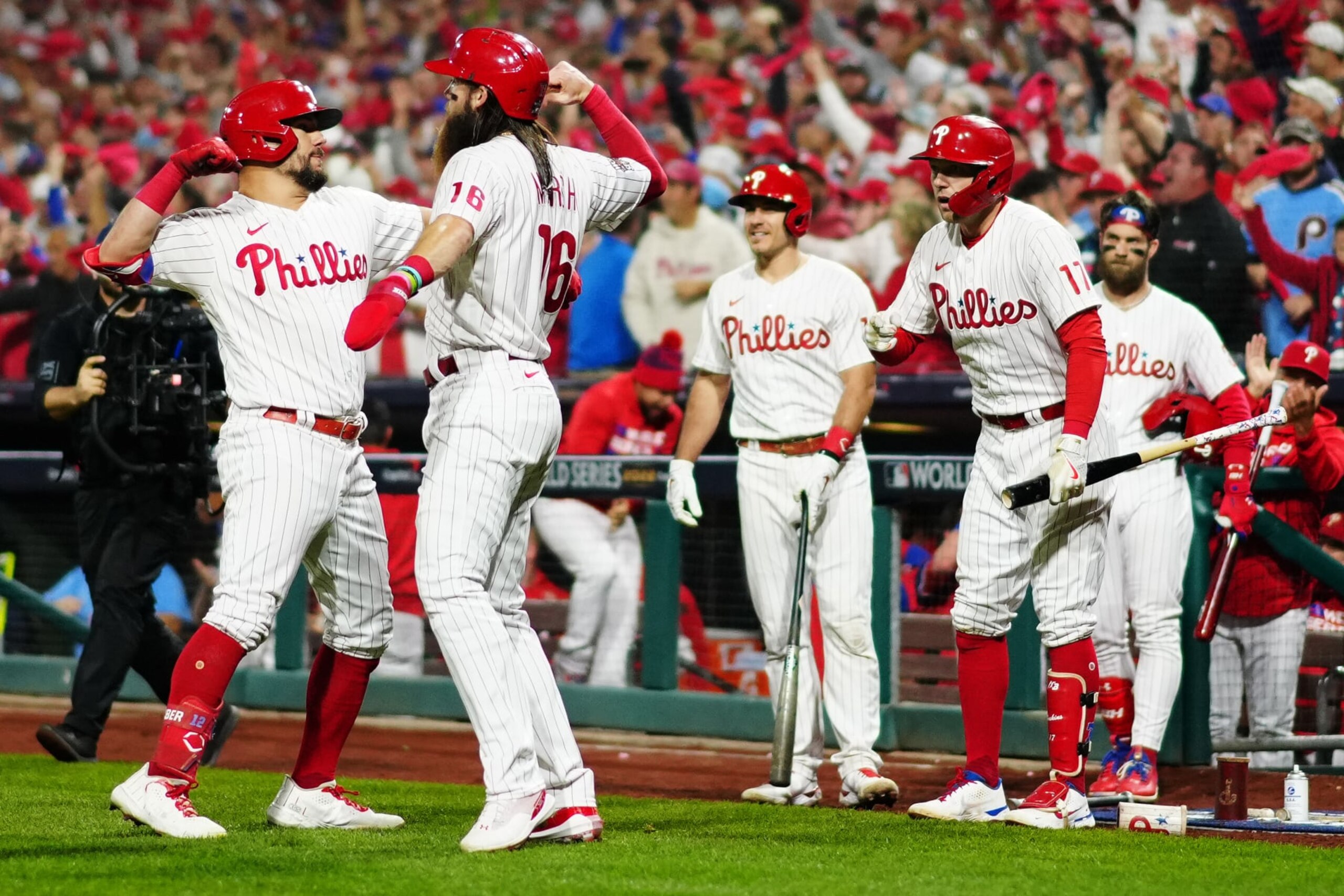 PHILADELPHIA, PA - NOVEMBER 01: Kyle Schwarber #12 of the Philadelphia Phillies is congratulated by Brandon Marsh #16 after hitting a two-run home run in the fifth inning during Game 3 of the 2022 World Series between the Houston Astros and the Philadelphia Phillies at Citizens Bank Park on Tuesday, November 1, 2022 in Philadelphia, Pennsylvania. (Photo by Daniel Shirey/MLB Photos via Getty Images) PHILADELPHIA, PA - NOVEMBER 01: Kyle Schwarber #12 of the Philadelphia Phillies is congratulated by Brandon Marsh #16 after hitting a two-run home run in the fifth inning during Game 3 of the 2022 World Series between the Houston Astros and the Philadelphia Phillies at Citizens Bank Park on Tuesday, November 1, 2022 in Philadelphia, Pennsylvania. (Photo by Daniel Shirey/MLB Photos via Getty Images)