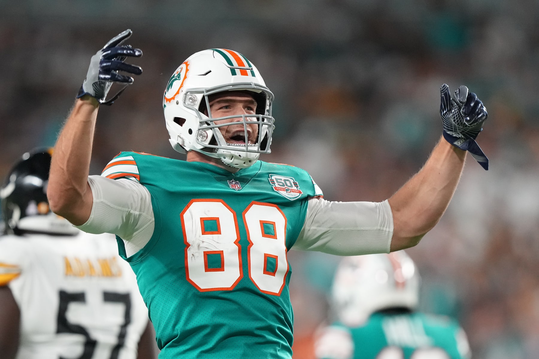 MIAMI GARDENS, FLORIDA - OCTOBER 23: Mike Gesicki #88 of the Miami Dolphins celebrates after a catch during the first quarter against the Pittsburgh Steelers at Hard Rock Stadium on October 23, 2022 in Miami Gardens, Florida. (Photo by Eric Espada/Getty Images)