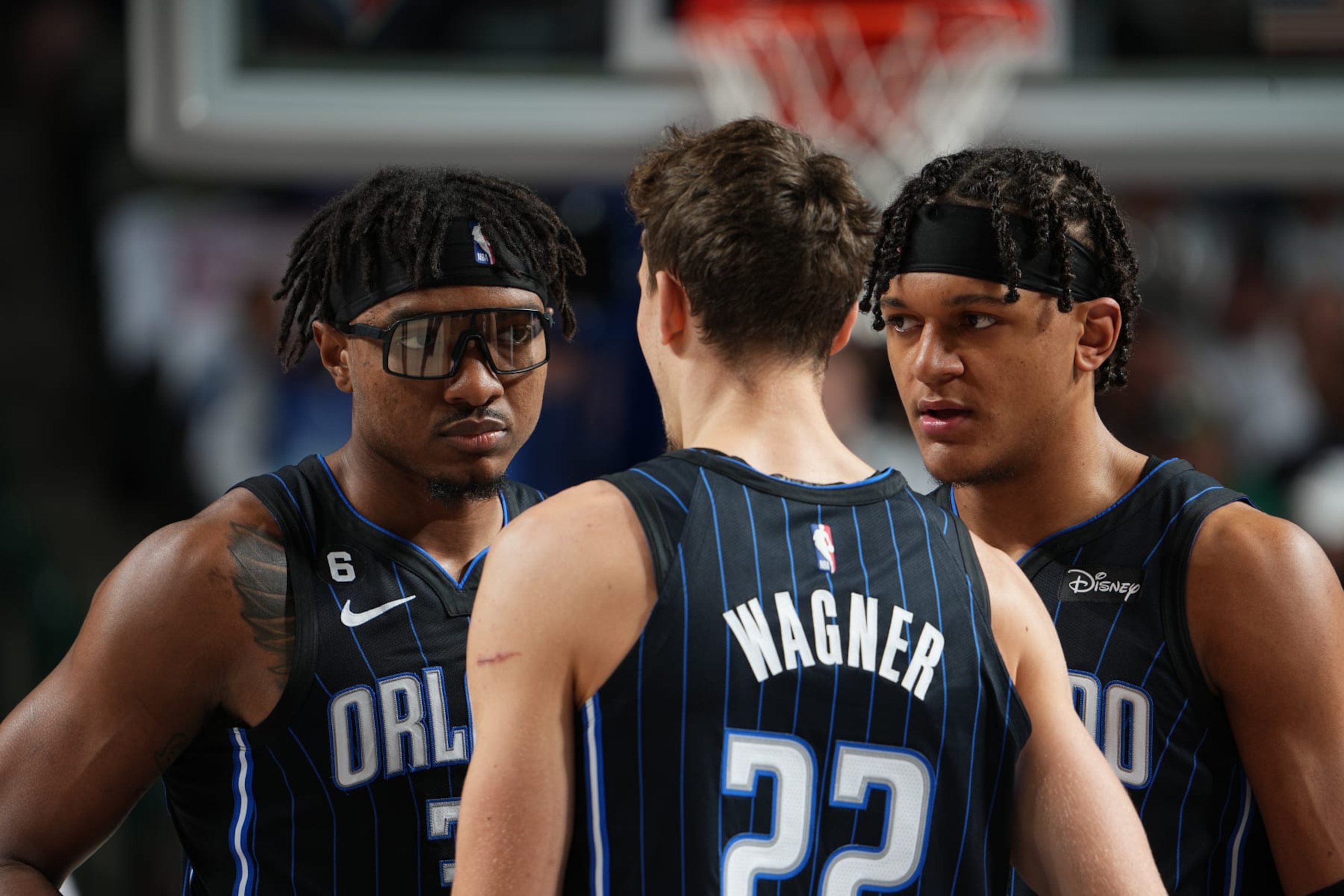 DALLAS, TX - OCTOBER 30: Wendell Carter Jr. #34 of the Orlando Magic, Paolo Banchero #5, and Franz Wagner #22 huddle up before the game against the Dallas Mavericks on October 30, 2022 at the American Airlines Center in Dallas, Texas. NOTE TO USER: User expressly acknowledges and agrees that, by downloading and or using this photograph, User is consenting to the terms and conditions of the Getty Images License Agreement. Mandatory Copyright Notice: Copyright 2022 NBAE (Photo by Glenn James/NBAE via Getty Images)