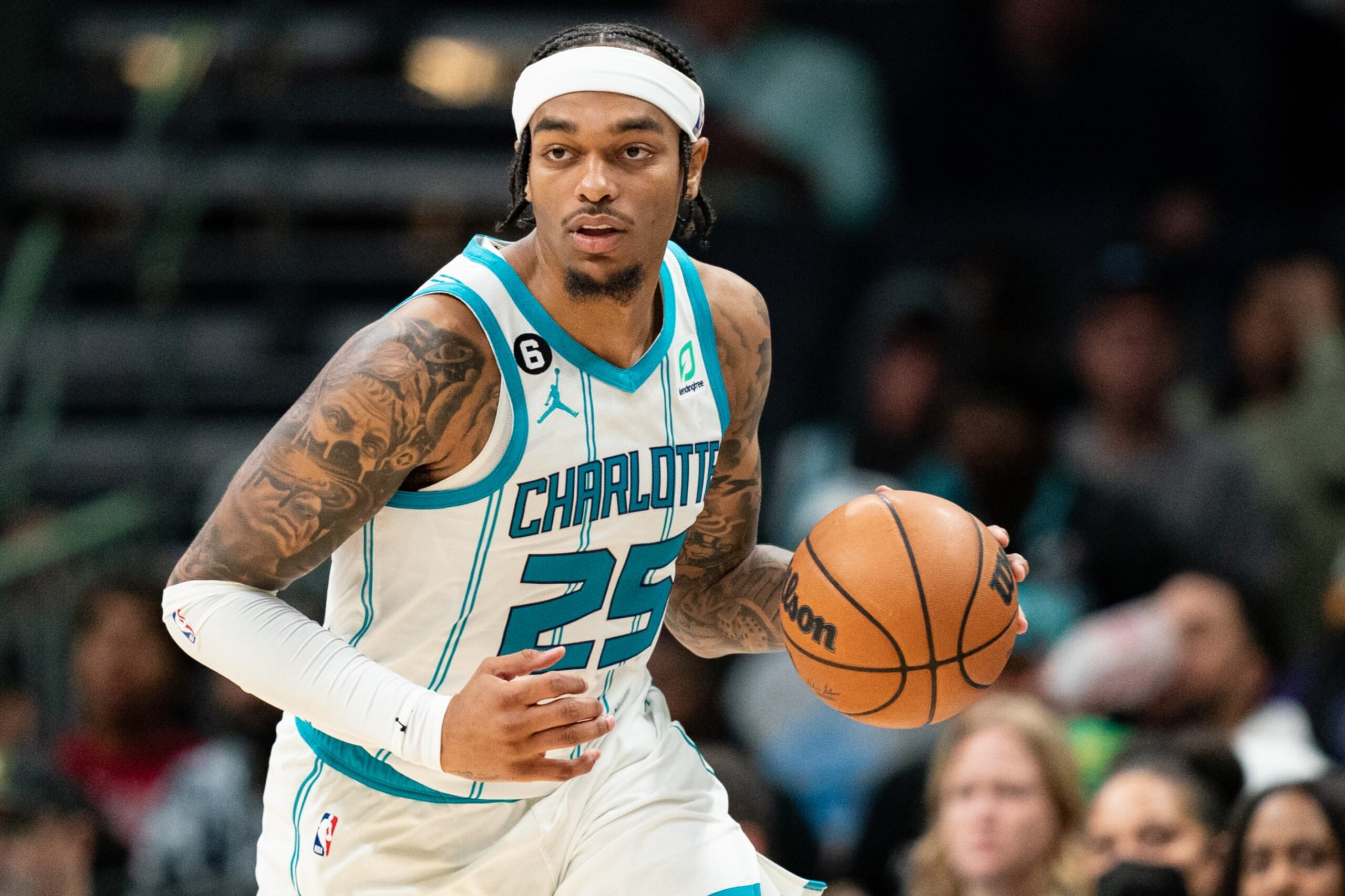 CHARLOTTE, NORTH CAROLINA - OCTOBER 31: P.J. Washington #25 of the Charlotte Hornets brings the ball up court against the Sacramento Kings in the first quarter during their game at Spectrum Center on October 31, 2022 in Charlotte, North Carolina. (Photo by Jacob Kupferman/Getty Images) NOTE TO USER: User expressly acknowledges and agrees that, by downloading and or using this photograph, User is consenting to the terms and conditions of the Getty Images License Agreement.