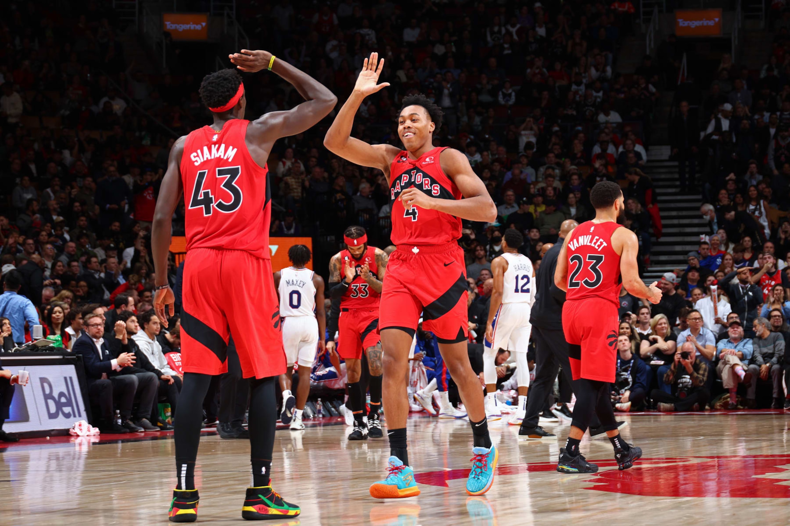 TORONTO, CANADA - OCTOBER 26: Pascal Siakam #43 and Scottie Barnes #4 of the Toronto Raptors high five against the Philadelphia 76ers on October 26, 2022 at the Scotiabank Arena in Toronto, Ontario, Canada. NOTE TO USER: User expressly acknowledges and agrees that, by downloading and or using this Photograph, user is consenting to the terms and conditions of the Getty Images License Agreement. Mandatory Copyright Notice: Copyright 2022 NBAE (Photo by Vaughn Ridley/NBAE via Getty Images)