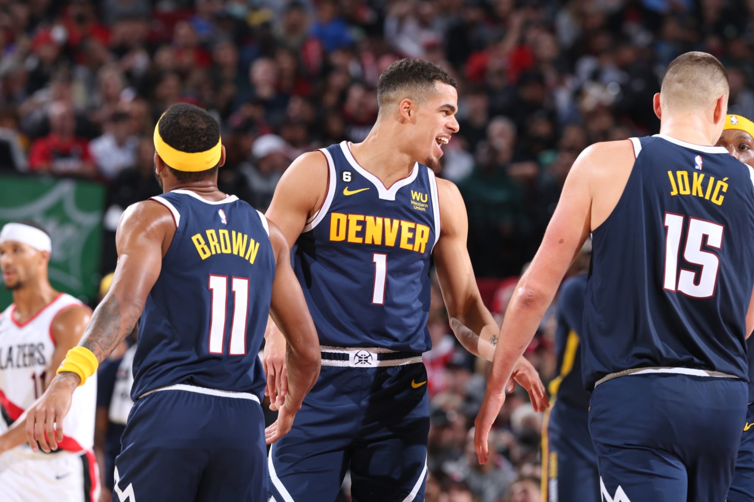 PORTLAND, OR - OCTOBER 24: Michael Porter Jr. #1 of the Denver Nuggets smiles during the game against the Portland Trail Blazers on October 24, 2022 at the Moda Center Arena in Portland, Oregon. NOTE TO USER: User expressly acknowledges and agrees that, by downloading and or using this photograph, user is consenting to the terms and conditions of the Getty Images License Agreement. Mandatory Copyright Notice: Copyright 2022 NBAE (Photo by Sam Forencich/NBAE via Getty Images)