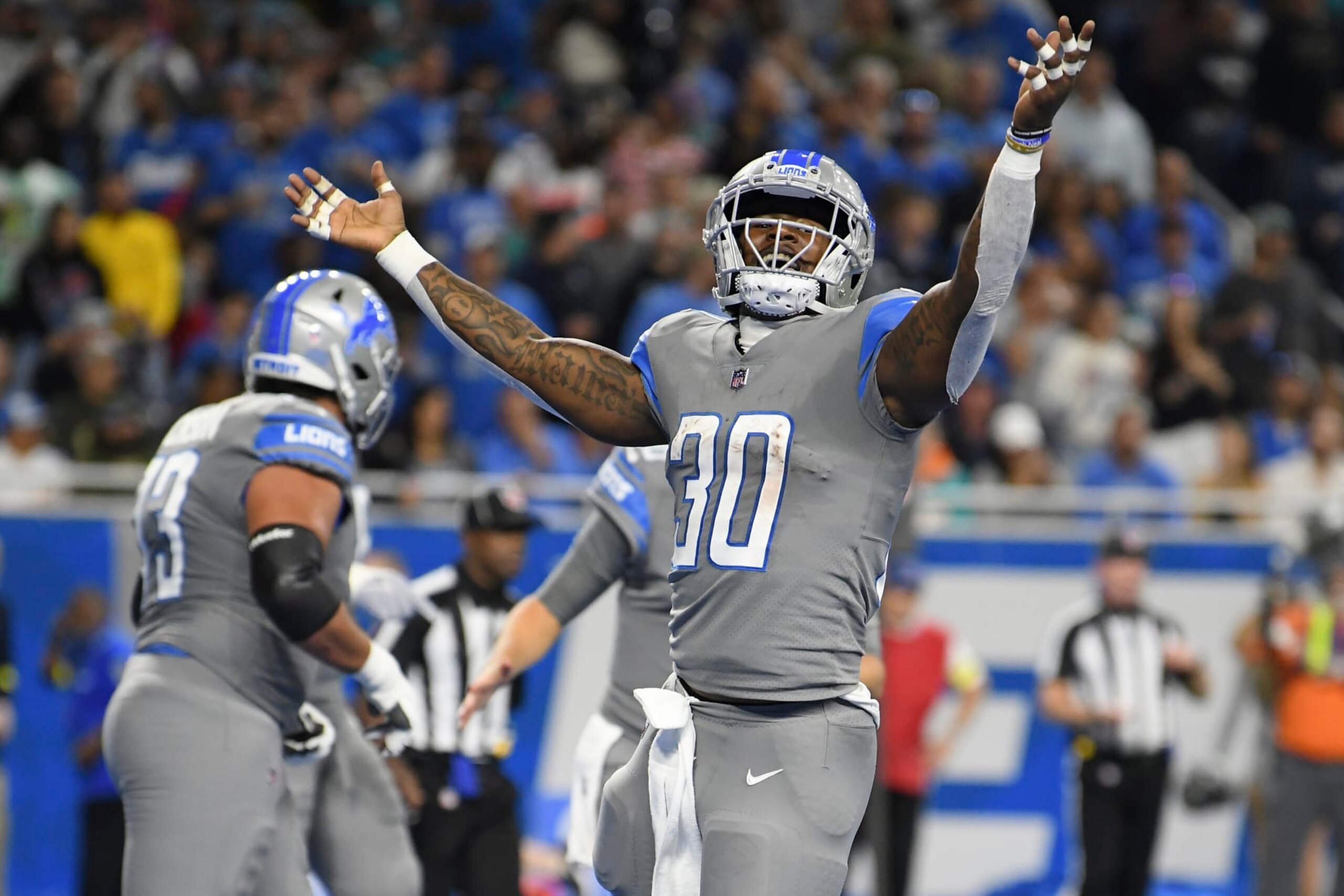 Detroit Lions running back Jamaal Williams reacts after 1-yard touchdown run during the first half of an NFL football game against the Miami Dolphins, Sunday, Oct. 30, 2022, in Detroit. (AP Photo/Lon Horwedel) Detroit Lions running back Jamaal Williams reacts after 1-yard touchdown run during the first half of an NFL football game against the Miami Dolphins, Sunday, Oct. 30, 2022, in Detroit. (AP Photo/Lon Horwedel)