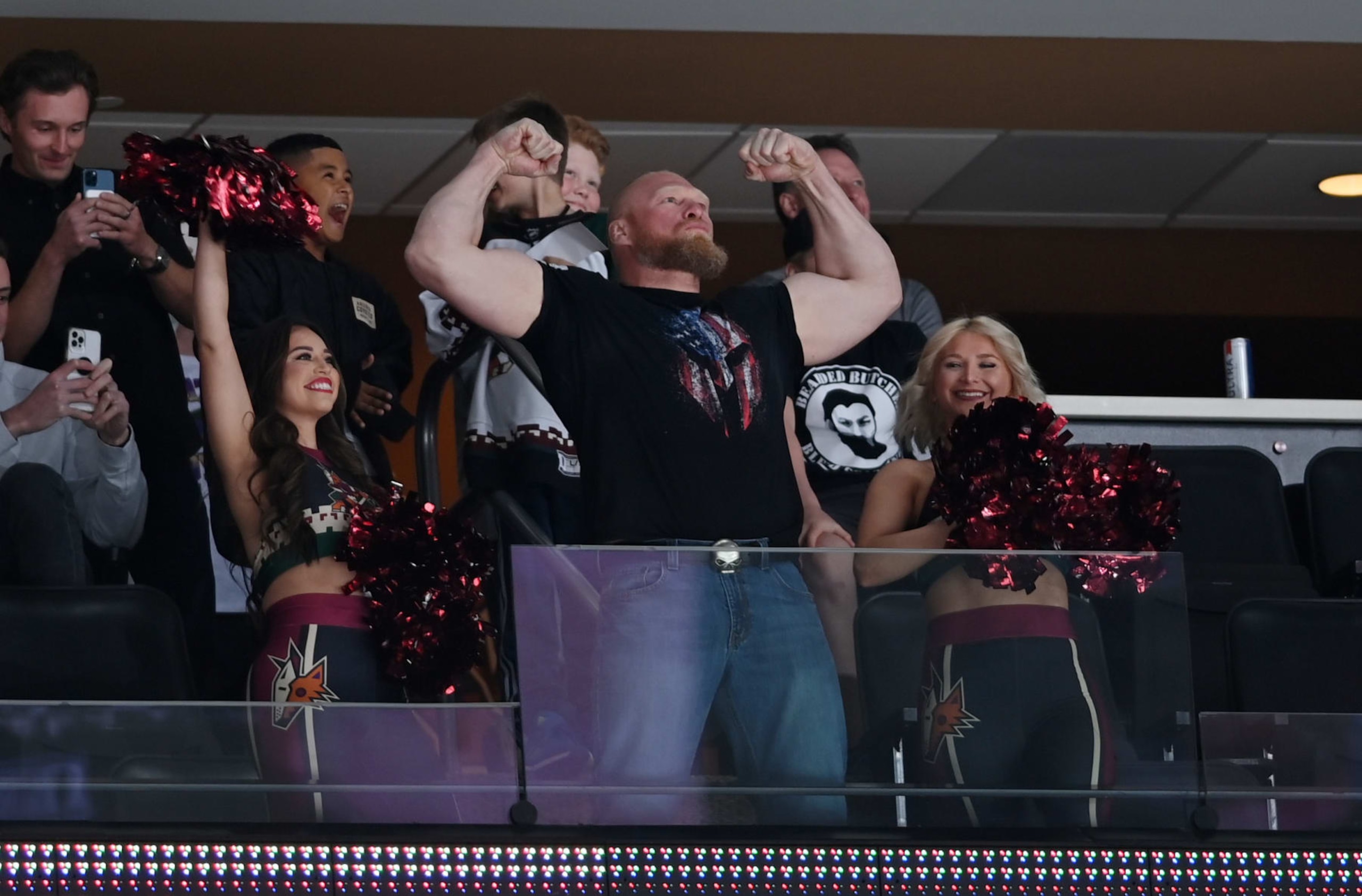 GLENDALE, ARIZONA - APRIL 22: Brock Lesnar, former WWE champion and UFC champion, flexes for the crowd during a game between the Arizona Coyotes and Washington Capitals at Gila River Arena on April 22, 2022 in Glendale, Arizona. (Photo by Norm Hall/NHLI via Getty Images) GLENDALE, ARIZONA - APRIL 22: Brock Lesnar, former WWE champion and UFC champion, flexes for the crowd during a game between the Arizona Coyotes and Washington Capitals at Gila River Arena on April 22, 2022 in Glendale, Arizona. (Photo by Norm Hall/NHLI via Getty Images)