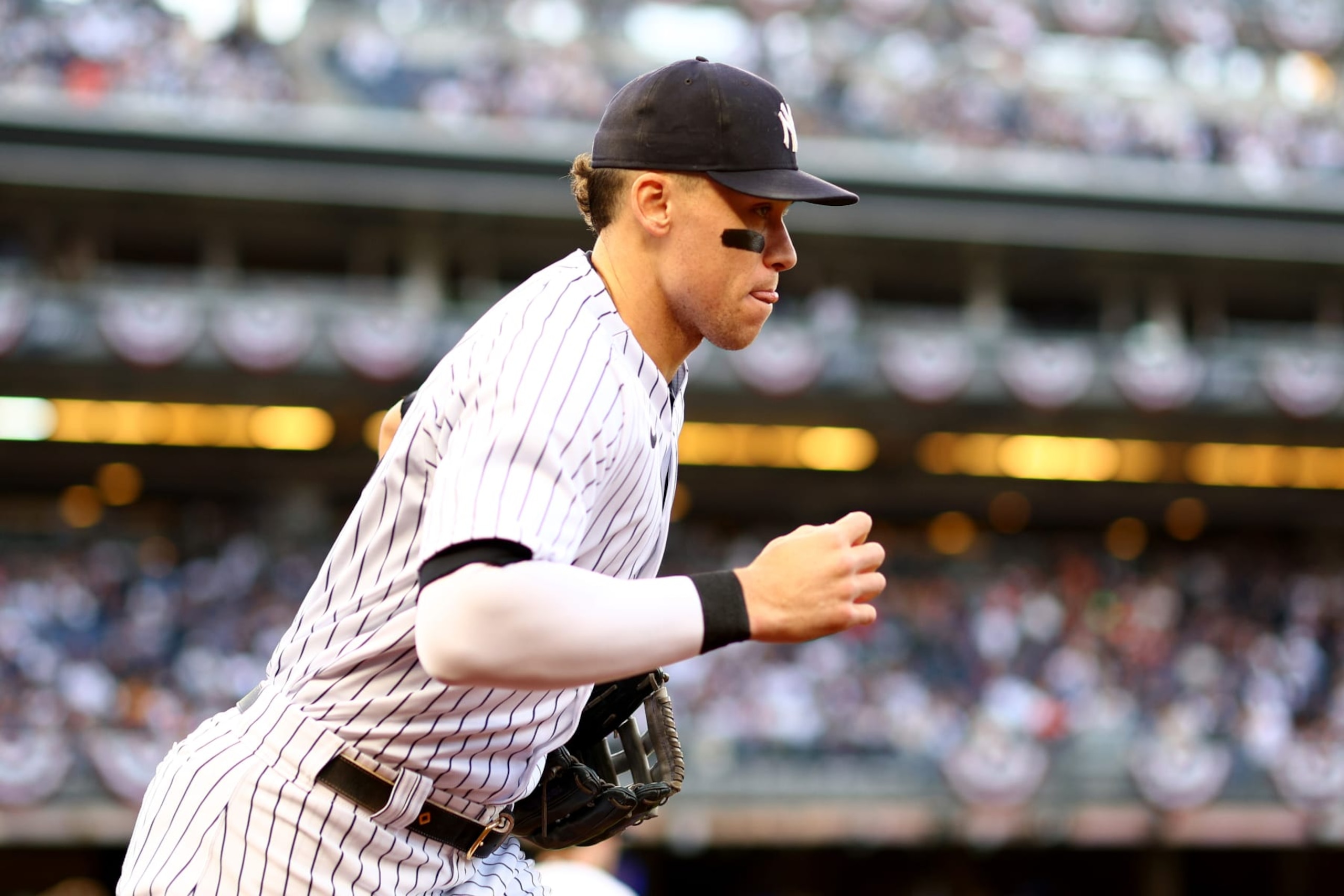 NEW YORK, NEW YORK - OCTOBER 22: Aaron Judge #99 of the New York Yankees runs onto the field prior to game three of the American League Championship Series against the Houston Astros at Yankee Stadium on October 22, 2022 in New York City. (Photo by Elsa/Getty Images) NEW YORK, NEW YORK - OCTOBER 22: Aaron Judge #99 of the New York Yankees runs onto the field prior to game three of the American League Championship Series against the Houston Astros at Yankee Stadium on October 22, 2022 in New York City. (Photo by Elsa/Getty Images)