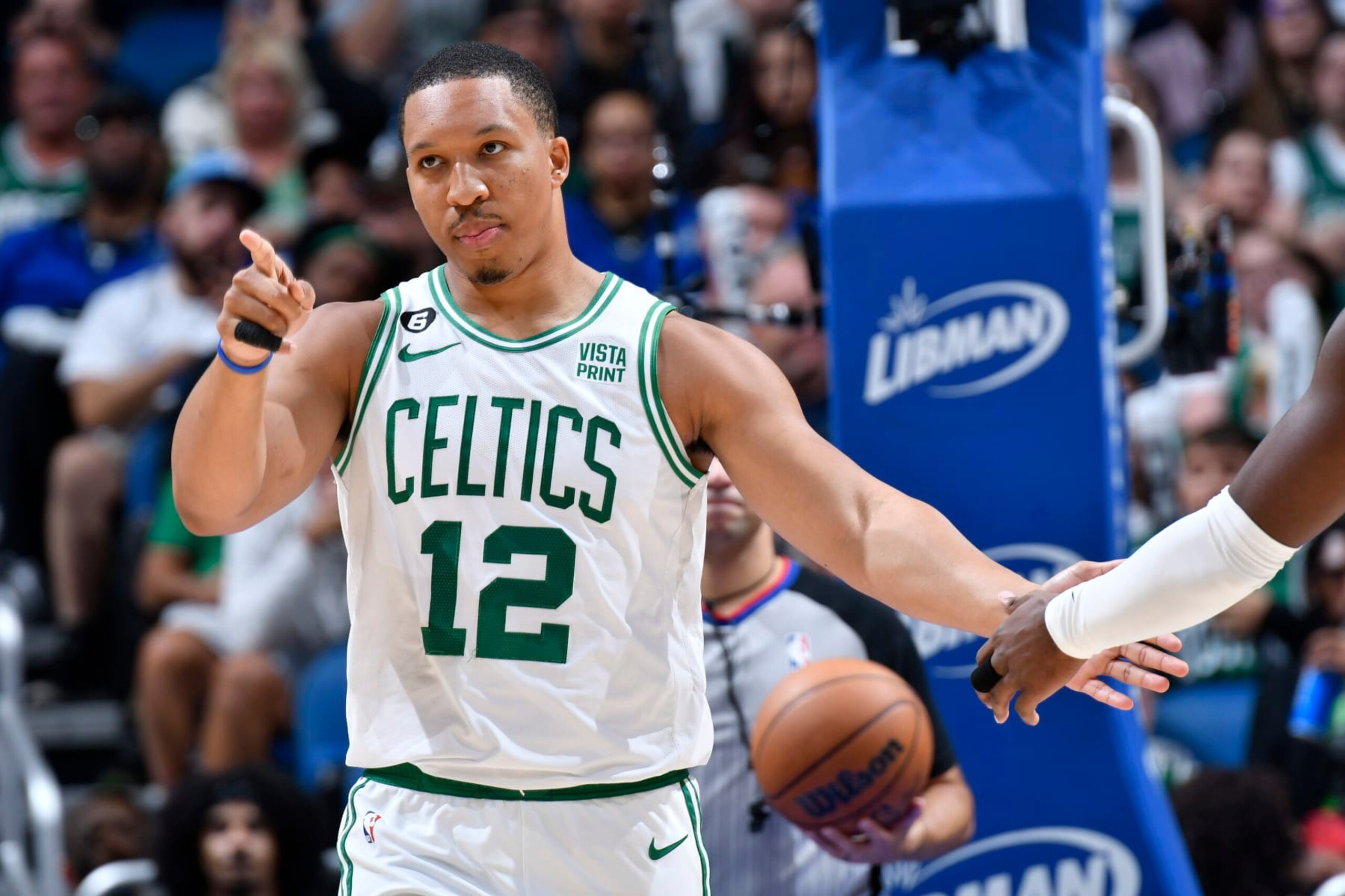 ORLANDO, FL - OCTOBER 22: Grant Williams #12 of the Boston Celtics celebrates during the game against the Orlando Magic on October 22, 2022 at Amway Center in Orlando, Florida. NOTE TO USER: User expressly acknowledges and agrees that, by downloading and or using this photograph, User is consenting to the terms and conditions of the Getty Images License Agreement. Mandatory Copyright Notice: Copyright 2022 NBAE (Photo by Fernando Medina/NBAE via Getty Images)