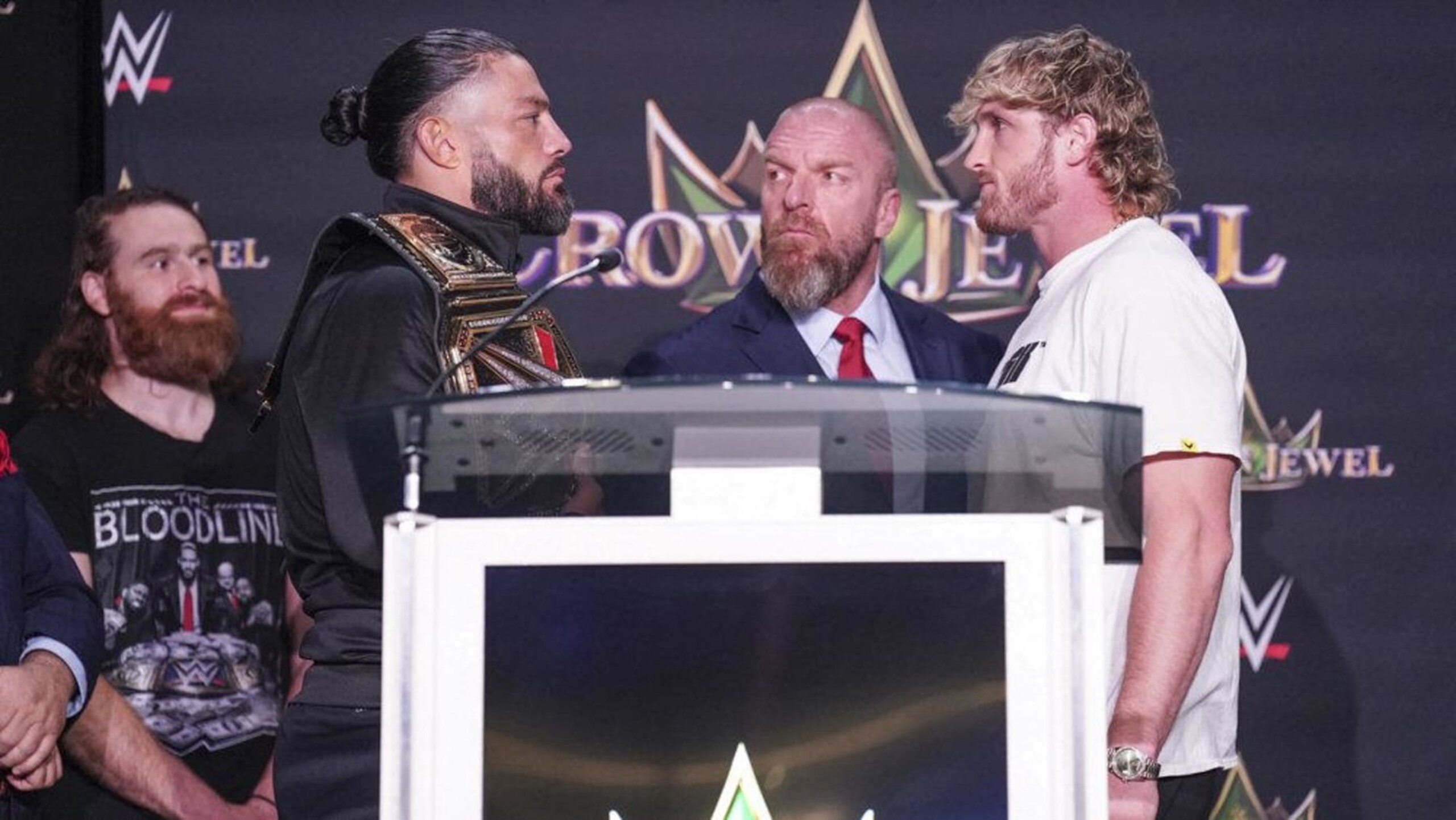 Roman Reigns and Logan Paul at the Crown Jewel press conference