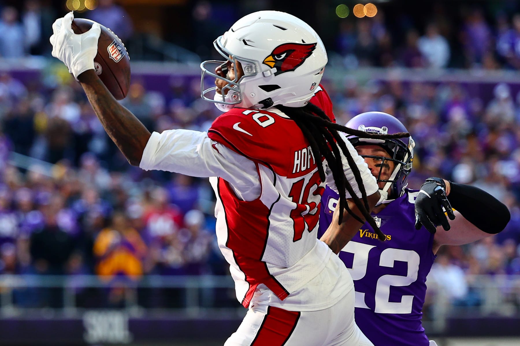 MINNEAPOLIS, MINNESOTA - OCTOBER 30: DeAndre Hopkins #10 of the Arizona Cardinals catches the ball for a touchdown as Harrison Smith #22 of the Minnesota Vikings defends during the second quarter at U.S. Bank Stadium on October 30, 2022 in Minneapolis, Minnesota. (Photo by Adam Bettcher/Getty Images)