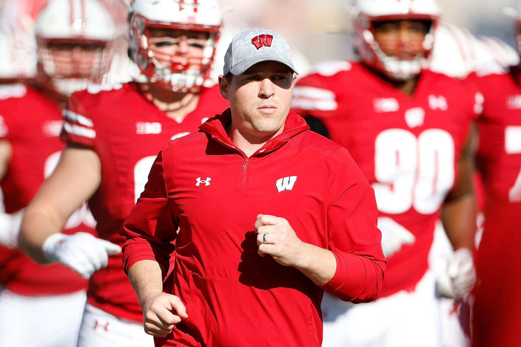 MADISON, WISCONSIN - OCTOBER 22: Head coach Jim Leonard of the Wisconsin Badgers takes the field before the game against the Purdue Boilermakers at Camp Randall Stadium on October 22, 2022 in Madison, Wisconsin. (Photo by John Fisher/Getty Images)