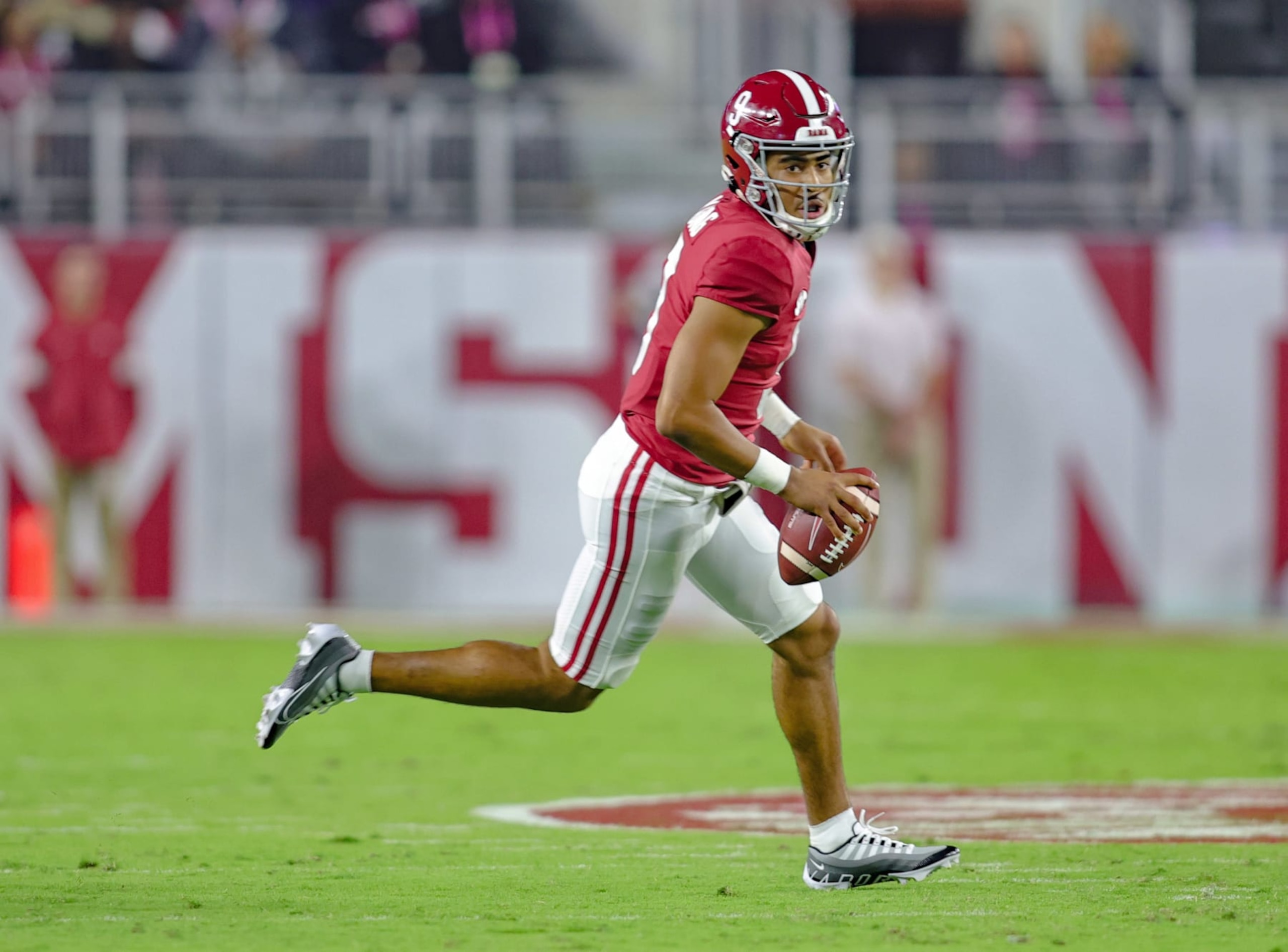 TUSCALOOSA, AL - OCTOBER 22: Bryce Young #9 of the Alabama Crimson Tide runs the ball during the first half against the Mississippi State Bulldogs at Bryant-Denny Stadium on October 22, 2022 in Tuscaloosa, Alabama. (Photo by Brandon Sumrall/Getty Images)