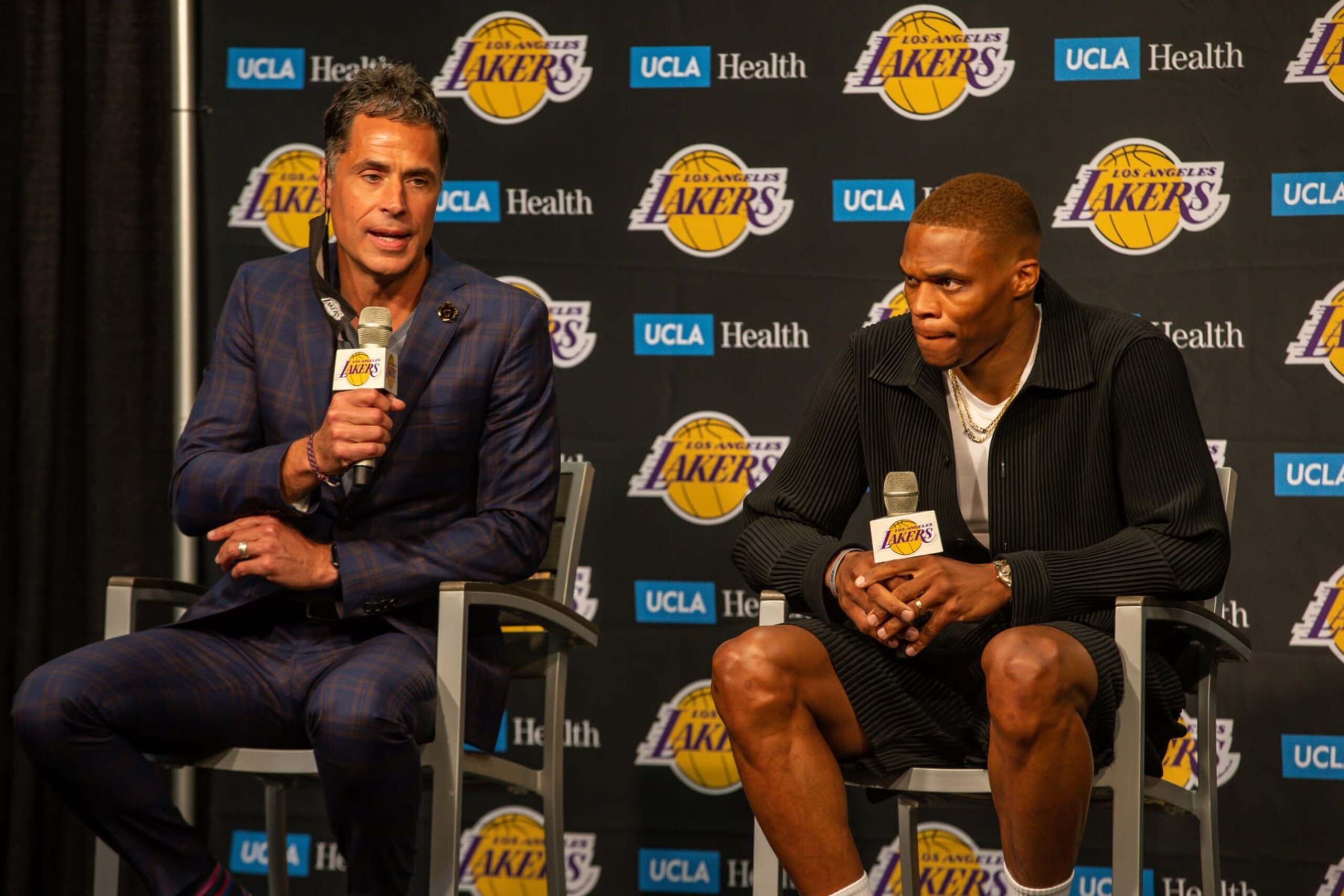 LOS ANGELES, CA - AUGUST 10: Los Angeles Lakers General Manager Rob Pelinka (L) and Russell Westbrook during the Los Angeles Lakers Introductory press conference for Russell Westbrook on August 10, 2021, at Staples Center in Los Angeles, CA. (Photo by Jevone Moore/Icon Sportswire via Getty Images)