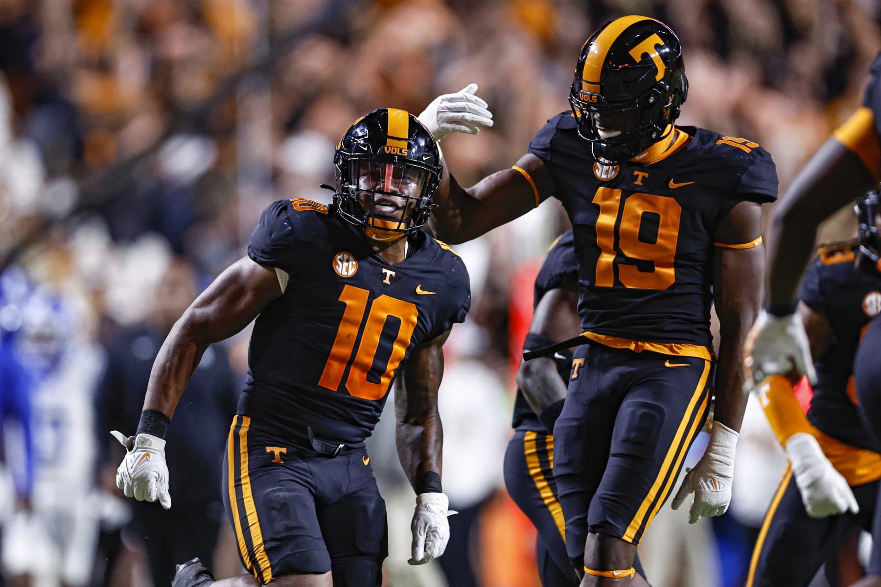 Tennessee linebacker Juwan Mitchell (10) celebrates with defensive lineman Joshua Josephs (19) after intercepting the ball during the first half of an NCAA college football game against Kentucky Saturday, Oct. 29, 2022, in Knoxville, Tenn. (AP Photo/Wade Payne)