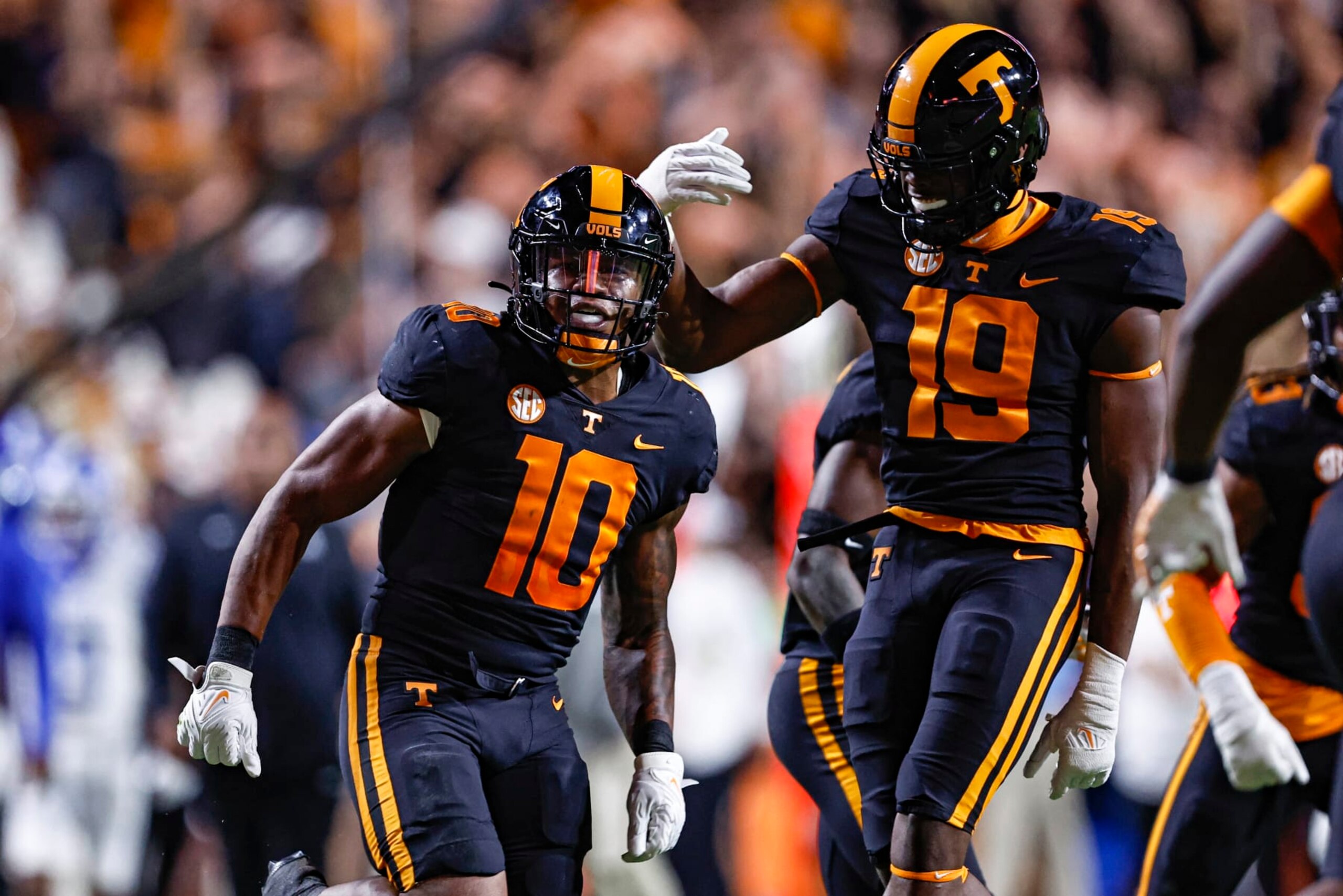 Tennessee linebacker Juwan Mitchell (10) celebrates with defensive lineman Joshua Josephs (19) after intercepting the ball during the first half of an NCAA college football game against Kentucky Saturday, Oct. 29, 2022, in Knoxville, Tenn. (AP Photo/Wade Payne)