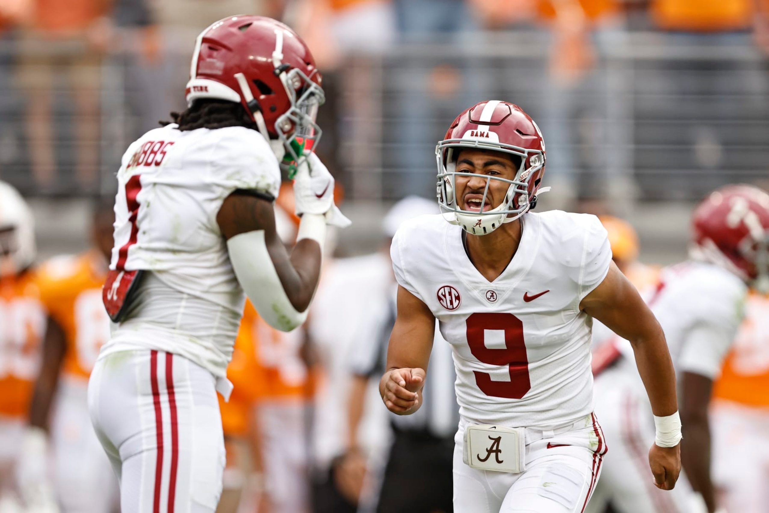 Alabama quarterback Bryce Young (9) yells a play to running back Jahmyr Gibbs (1) during the first half of an NCAA college football game against Tennessee Saturday, Oct. 15, 2022, in Knoxville, Tenn. (AP Photo/Wade Payne)