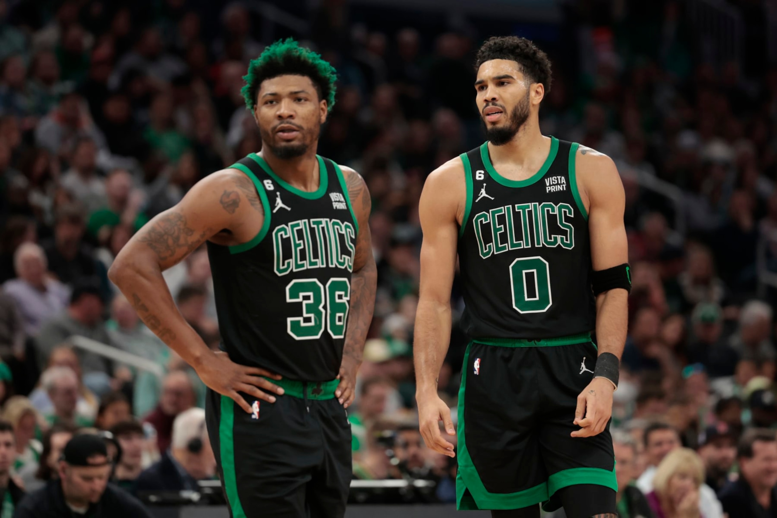 BOSTON, MASSACHUSETTS - OCTOBER 30: Jayson Tatum #0 of the Boston Celtics and Marcus Smart #36 of the Boston Celtics look on against the Washington Wizards during the second quarter at TD Garden on October 30, 2022 in Boston, Massachusetts. NOTE TO USER: User expressly acknowledges and agrees that, by downloading and or using this photograph, User is consenting to the terms and conditions of the Getty Images License Agreement. (Photo by Nick Grace/Getty Images) BOSTON, MASSACHUSETTS - OCTOBER 30: Jayson Tatum #0 of the Boston Celtics and Marcus Smart #36 of the Boston Celtics look on against the Washington Wizards during the second quarter at TD Garden on October 30, 2022 in Boston, Massachusetts. NOTE TO USER: User expressly acknowledges and agrees that, by downloading and or using this photograph, User is consenting to the terms and conditions of the Getty Images License Agreement. (Photo by Nick Grace/Getty Images)