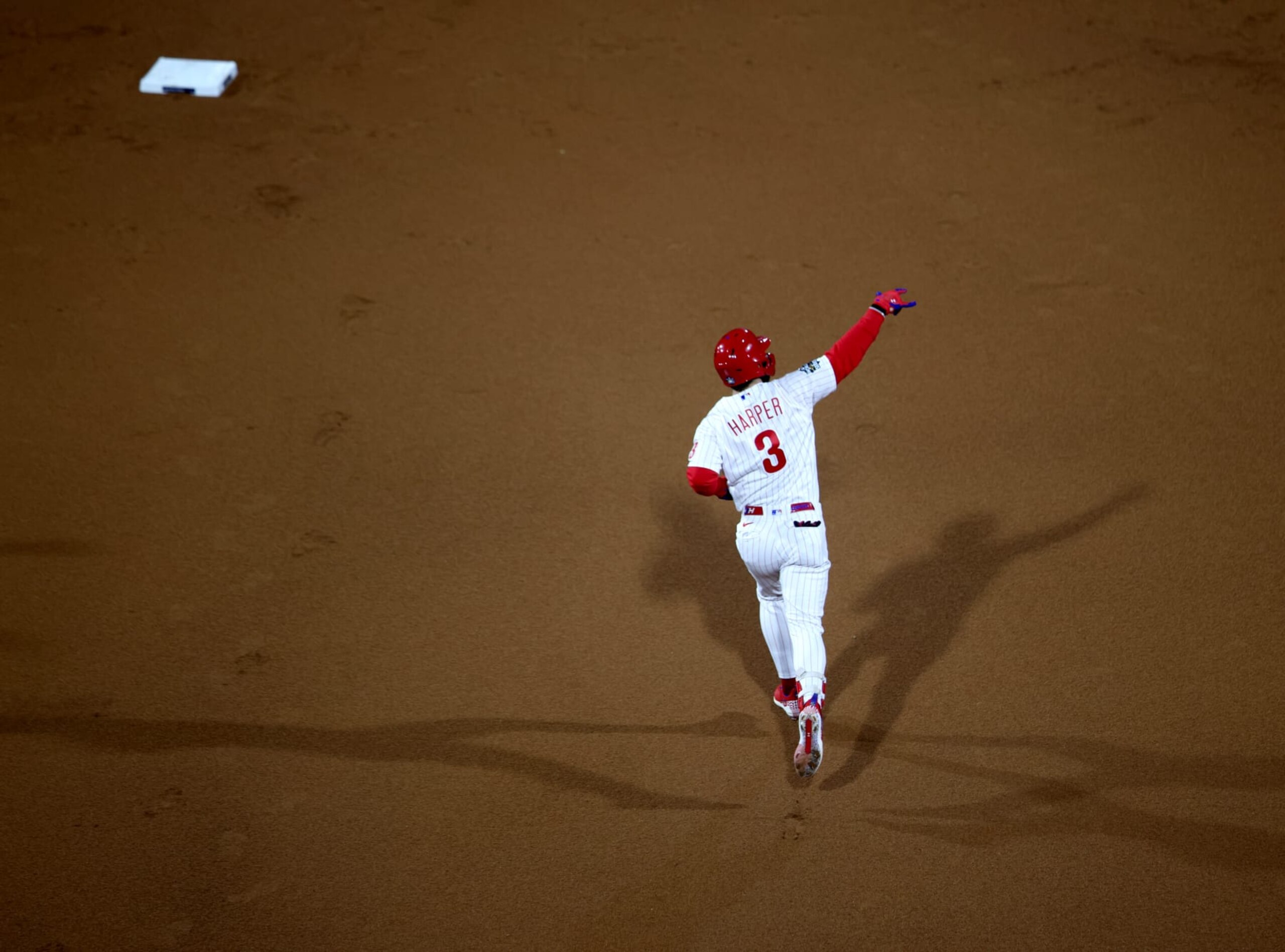 PHILADELPHIA, PA - NOVEMBER 01: Bryce Harper #3 of the Philadelphia Phillies rounds the bases after hitting a two-run home run in the first inning of Game 3 of the 2022 World Series between the Houston Astros and the Philadelphia Phillies at Citizens Bank Park on Tuesday, November 1, 2022 in Philadelphia, Pennsylvania. (Photo by Rob Tringali/MLB Photos via Getty Images)