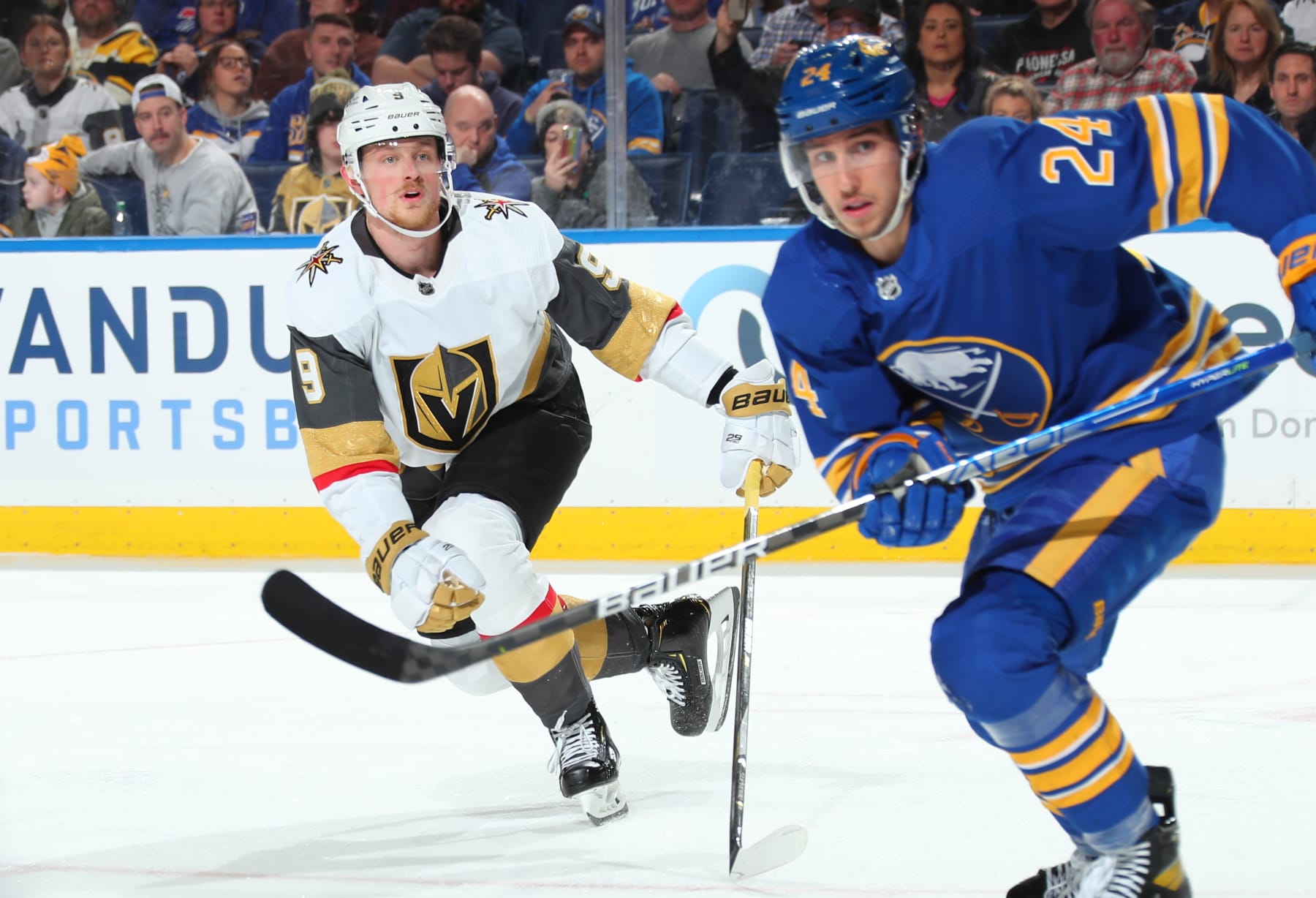 Vegas Golden Knights center Jack Eichel and Buffalo Sabres forward Dylan Cozens.